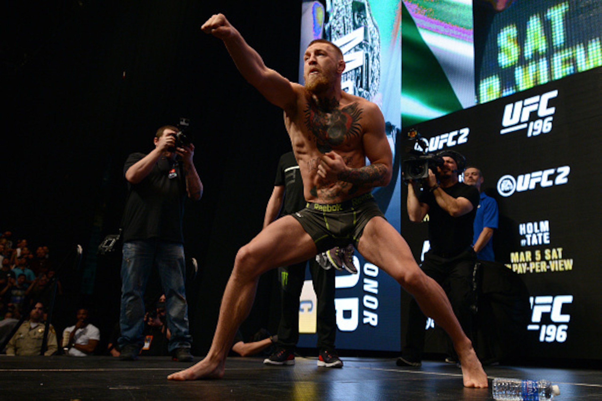 LAS VEGAS, NEVADA - MARCH 04:  Conor McGregor of Ireland interacts with fans onstage during the UFC 196 weigh-in at the MGM Grand Garden Arena on March 4, 2016 in Las Vegas, Nevada. (Photo by Jeff Bottari/Zuffa LLC/Zuffa LLC via Getty Images)