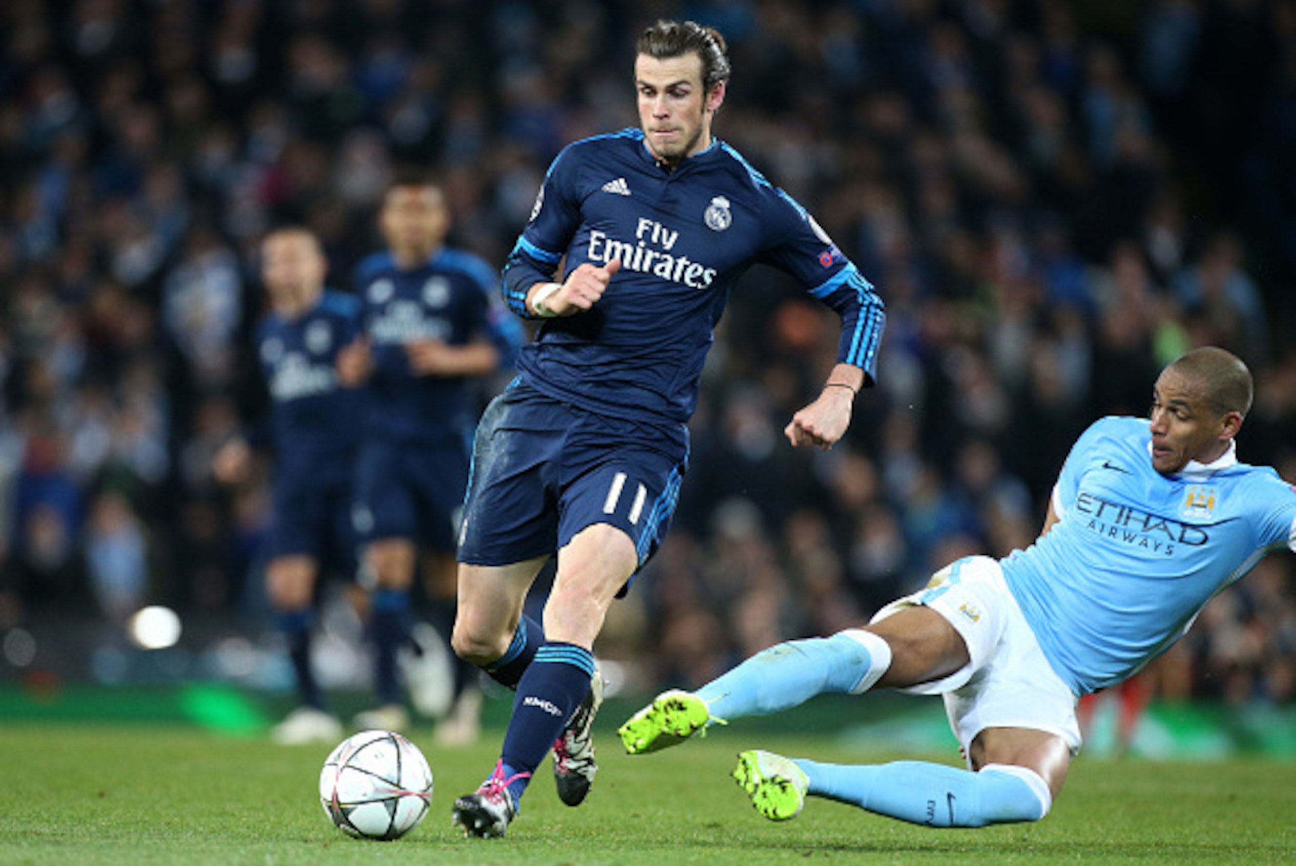 MANCHESTER, ENGLAND - APRIL 26: Gareth Bale of Real Madrid and Fernando of Manchester City in action during the UEFA Champions League semi final first leg match between Manchester City FC and Real Madrid at Etihad Stadium on April 26, 2016 in Manchester, 