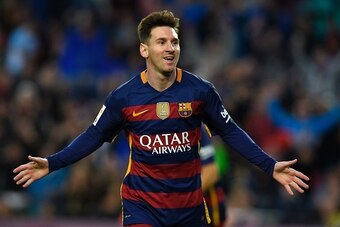 Barcelona's Argentinian forward Lionel Messi celebrates after scoring a goal during the Spanish league football match FC Barcelona vs Real Sporting de Gijï¿½ï¿½ï¿½ï¿½ï¿½ï¿½n at the Camp Nou stadium in Barcelona on April 23, 2016. / AFP / LLUIS GENE        (Photo cred