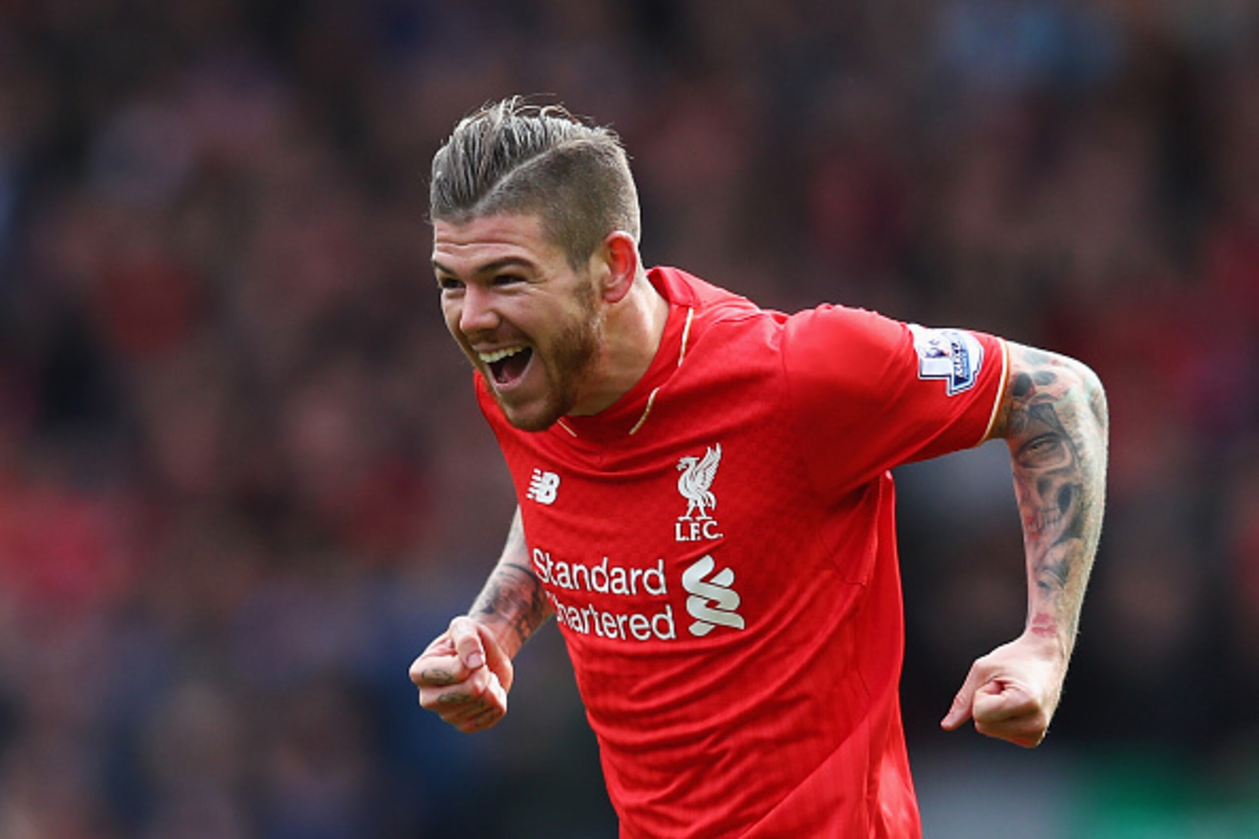 LIVERPOOL, UNITED KINGDOM - APRIL 10: Alberto Moreno of Liverpool (18) celebrates as he scores their first goal during the Barclays Premier League match between Liverpool and Stoke City at Anfield on April 10, 2016 in Liverpool, England. (Photo by Clive LIVERPOOL, UNITED KINGDOM - APRIL 10: Alberto Moreno of Liverpool (18) celebrates as he scores their first goal during the Barclays Premier League match between Liverpool and Stoke City at Anfield on April 10, 2016 in Liverpool, England. (Photo by Clive