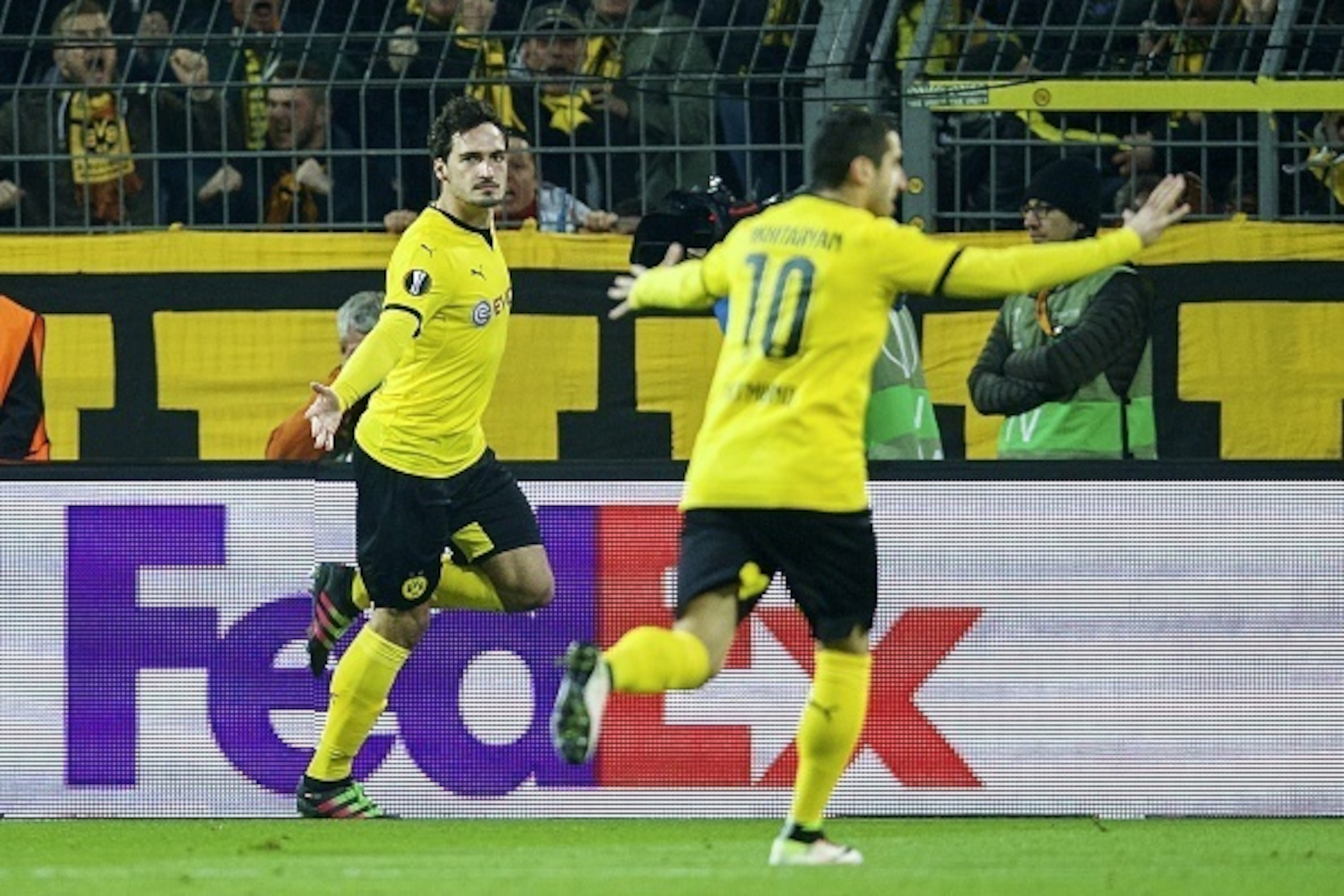 (L-R) Mats Hummels of Borussia Dortmund, Henrikh Mkhitaryan of Borussia Dortmund during the UEFA Europa League quarter-final match between Borussia Dortmund and Liverpool on April 7, 2016 at the Signal Iduna Park stadium at Dortmund, Germany.(Photo by VI 