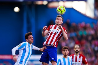 MADRID, SPAIN - APRIL 23: Saul Niguez of Atletico de Madrid saves on a header during the La Liga match between Club Atletico de Madrid and Malaga CF at Vicente Calderon Stadium on April 23, 2016 in Madrid, Spain.  (Photo by Gonzalo Arroyo Moreno/Getty Ima