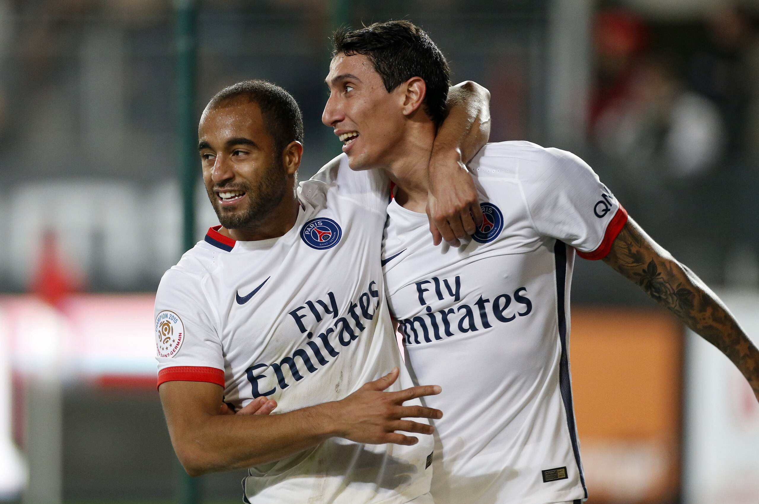 RENNES, FRANCE - OCTOBER 30: Angel Di Maria of PSG celebrates scoring the winning goal of PSG with teammate Lucas Moura (left) during the French Ligue 1 match between Stade Rennais (Rennes) and Paris Saint-Germain at Roazhon Park stadium on October 30, 20