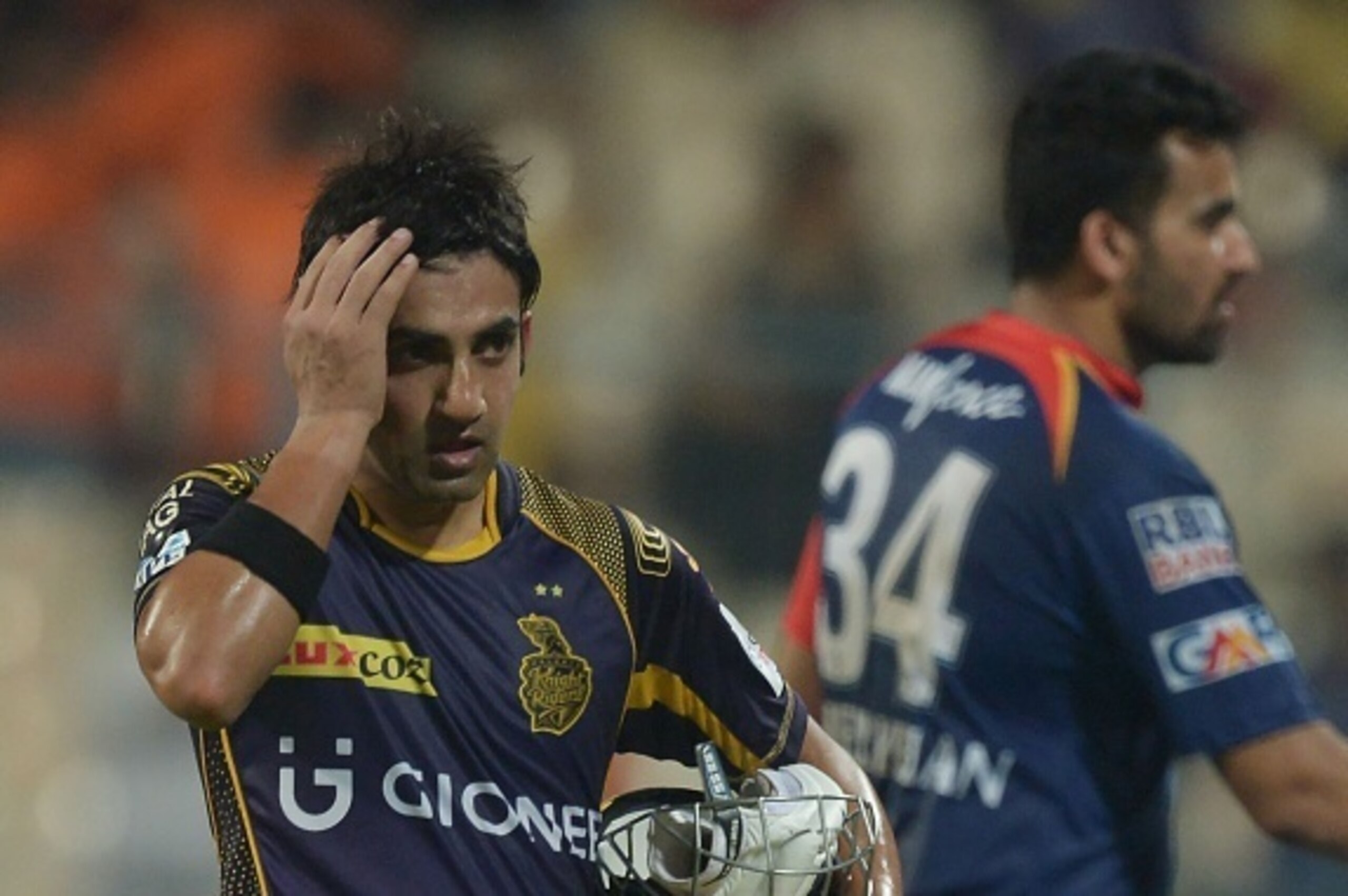 Kolkata Knight Riders captain Gautam Gambhir(L) and his Delhi Daredevils counterpart Zaheer Khanlooks on p during the 2016 Indian Premier League (IPL) Twenty20 cricket match between Kolkata Knight Riders and Delhi Daredevils at the Eden Gardens Cricket St