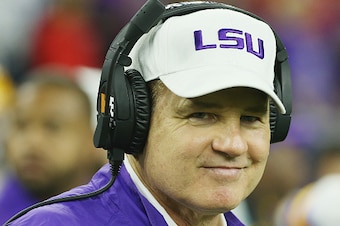 HOUSTON, TX - DECEMBER 29:  Head coach Les Miles of the LSU Tigers waits near the bench area before the start of their game against the Texas Tech Red Raiders during the AdvoCare V100 Texas Bowl at NRG Stadium on December 29, 2015 in Houston, Texas.  (Pho