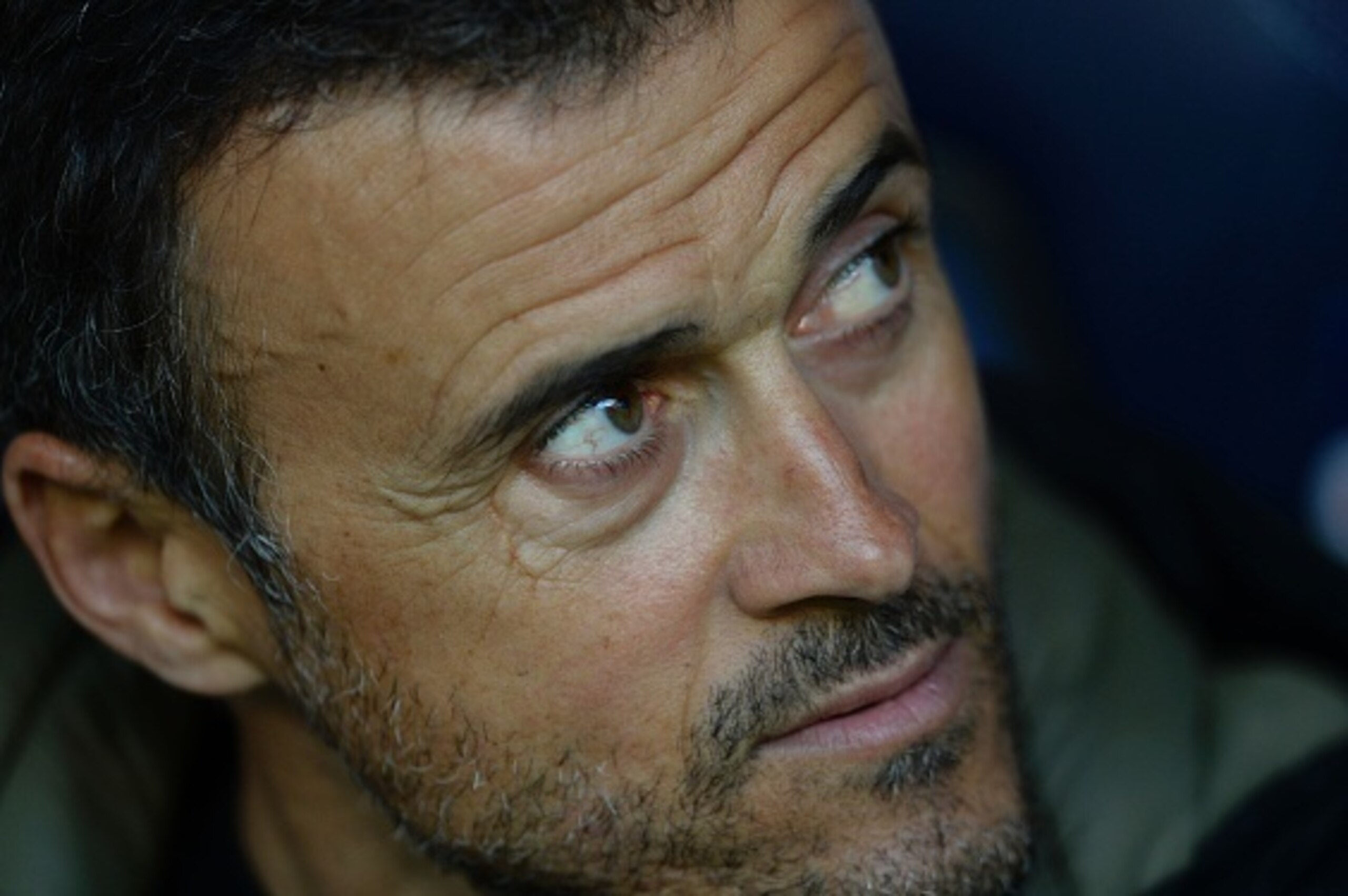 Barcelona's coach Luis Enrique looks on before the Spanish league football match RC Deportivo de la Coruna vs FC Barcelona at the Municipal de Riazor stadium in La Coruna on April 20, 2016. Barcelona won the match 8-0. / AFP / MIGUEL RIOPA        (Photo c