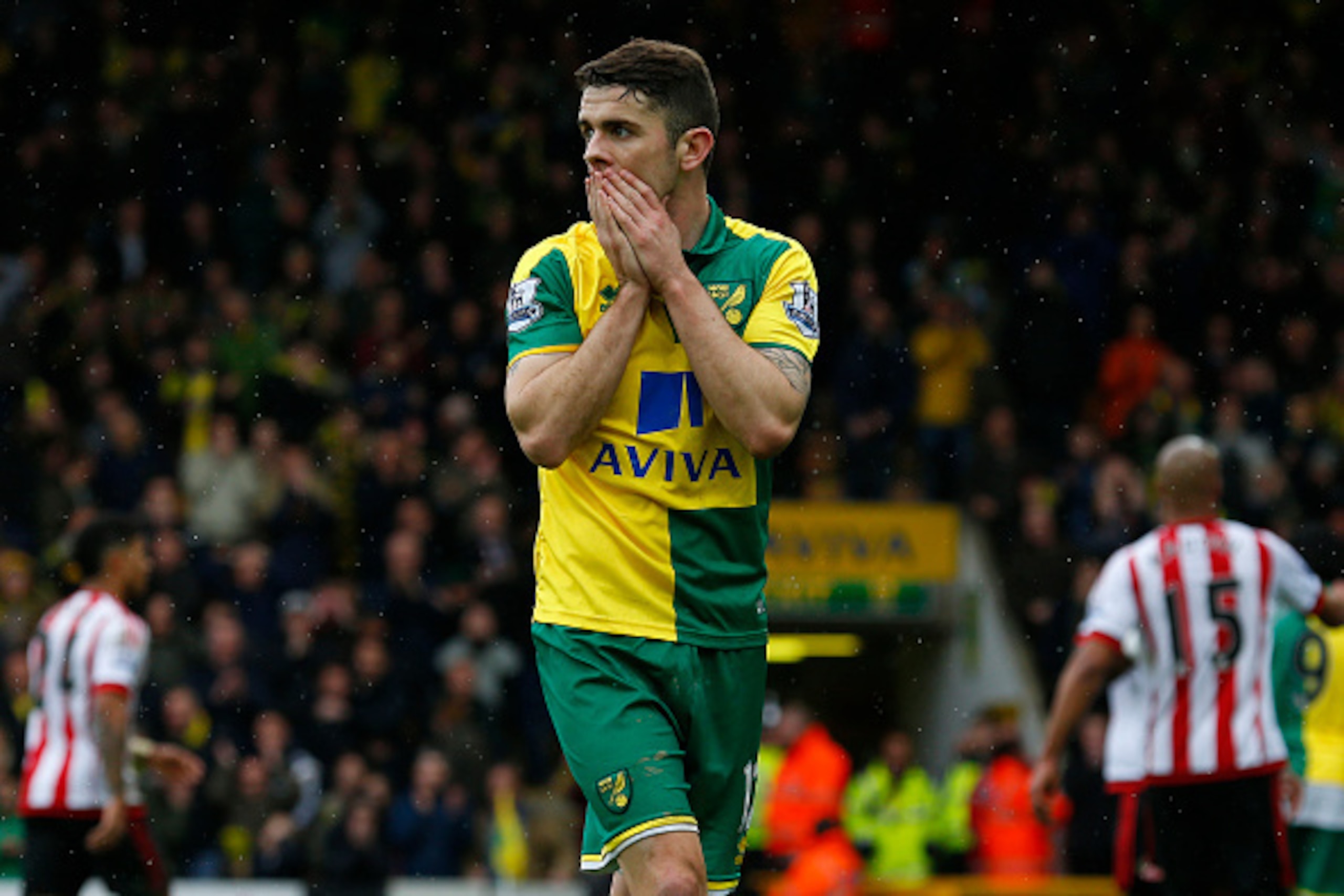 Norwich City's Irish midfielder Robbie Brady reacts during the English Premier League football match between Norwich City and Sunderland at Carrow Road in Norwich, eastern England, on April 16, 2016.


Sunderland won the game 3-0. / AFP / LINDSEY PARNABY 