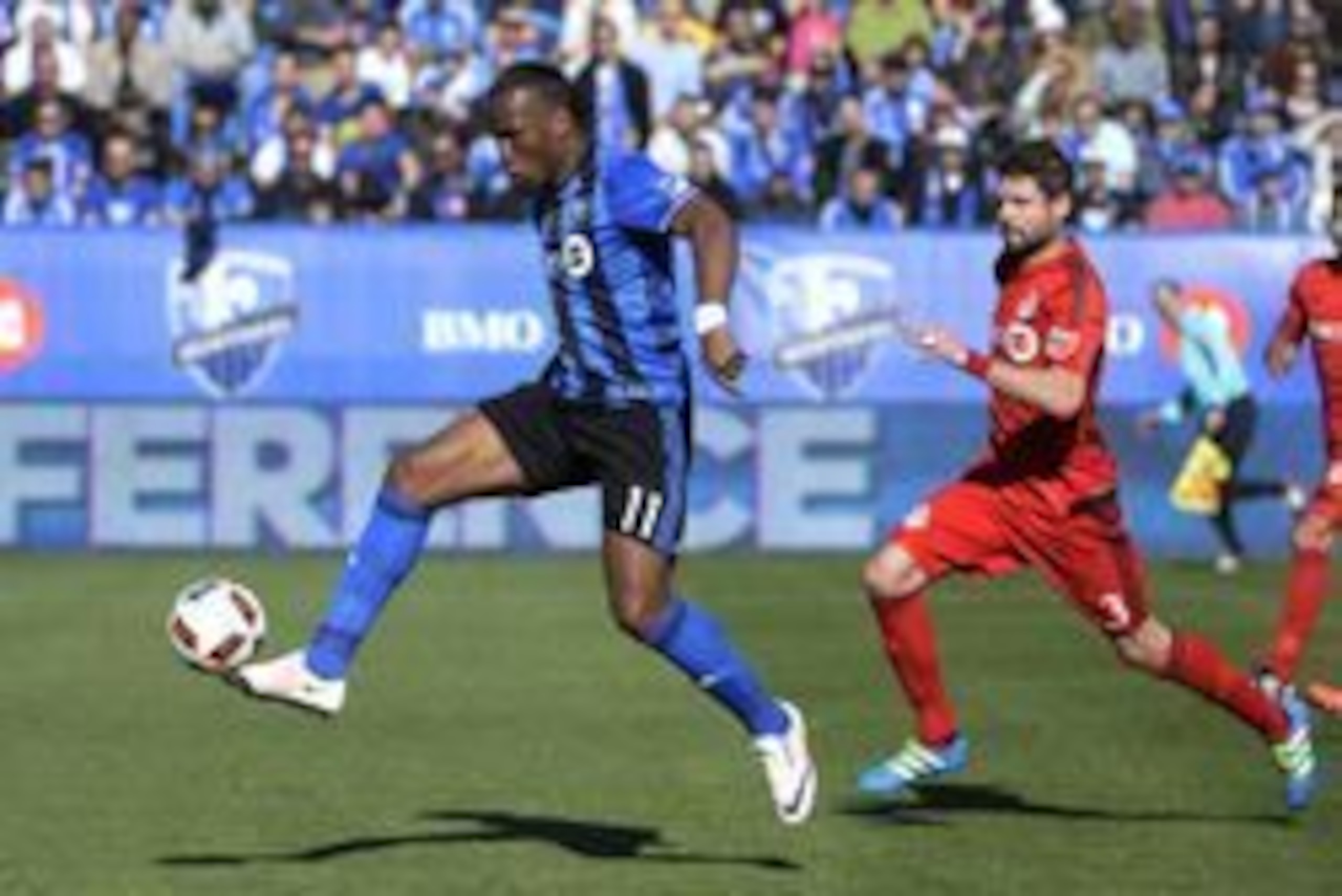 Apr 23, 2016; Montreal, Quebec, CAN; Montreal Impact forward Didier Drogba (11) plays the ball as Toronto FC defender Drew Moor (3) defends during the first half at Stade Saputo. Mandatory Credit: Eric Bolte-USA TODAY Sports Apr 23, 2016; Montreal, Quebec, CAN; Montreal Impact forward Didier Drogba (11) plays the ball as Toronto FC defender Drew Moor (3) defends during the first half at Stade Saputo. Mandatory Credit: Eric Bolte-USA TODAY Sports