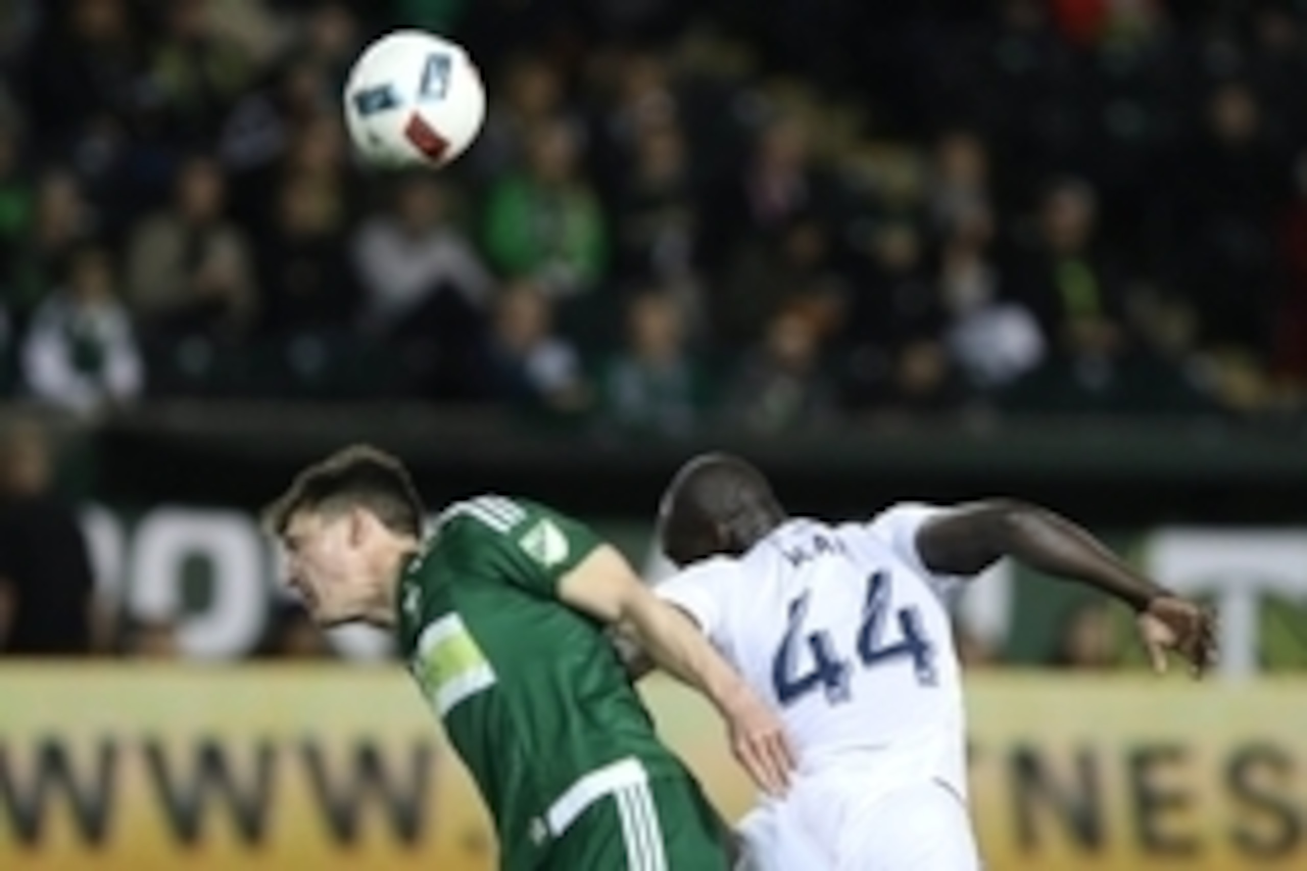 Feb 24, 2016; Portland, OR, USA; Portland Timbers midfielder Ben Zemanski (14) reacts after Vancouver Whitecaps FC defender Pa Modou Kah (44) heads the all over him at Providence Park. Mandatory Credit: Jaime Valdez-USA TODAY Sports Feb 24, 2016; Portland, OR, USA; Portland Timbers midfielder Ben Zemanski (14) reacts after Vancouver Whitecaps FC defender Pa Modou Kah (44) heads the all over him at Providence Park. Mandatory Credit: Jaime Valdez-USA TODAY Sports