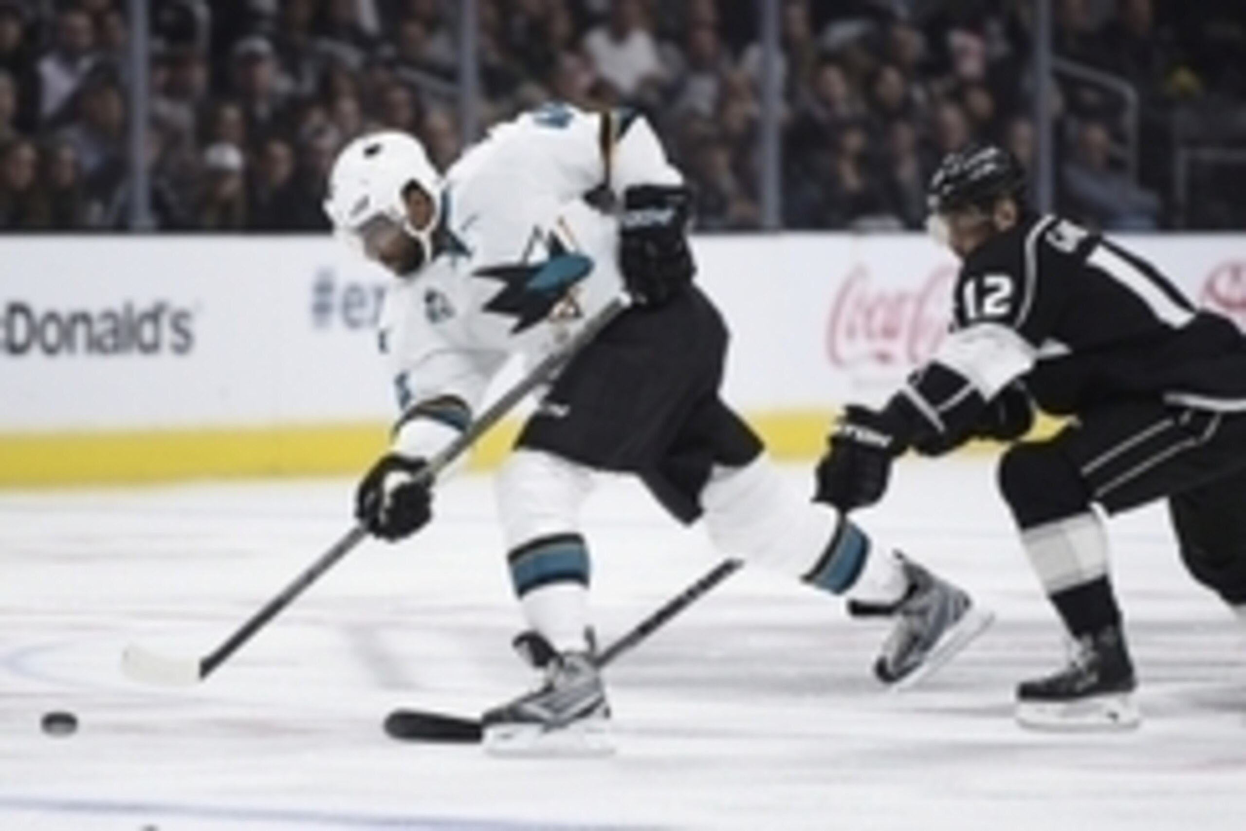 Apr 16, 2016; Los Angeles, CA, USA; San Jose Sharks right wing Joel Ward (42) attempts to shoot the puck as Los Angeles Kings right wing Marian Gaborik (12) defends during the third period in game two of the first round of the 2016 Stanley Cup Playoffs at