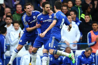LONDON, ENGLAND - MARCH 19 :  Cesc Fabregas of Chelsea celebrates after scoring to make it 1-1 with Cesar Azpilicueta and Oscar of Chelsea during the Barclays Premier League match between Chelsea and West Ham United at Stamford Bridge on March 19, 2016 in