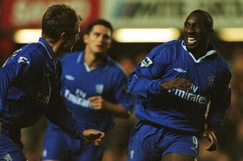 13 Mar 2002:  Jimmy Floyd Hasselbaink of Chelsea celebrates scoring the first goal during the FA Barclaycard Premiership match between Chelsea and Tottenham Hotspur at Stamford Bridge, London.  Mandatory Credit: Ben Radford/Getty Images