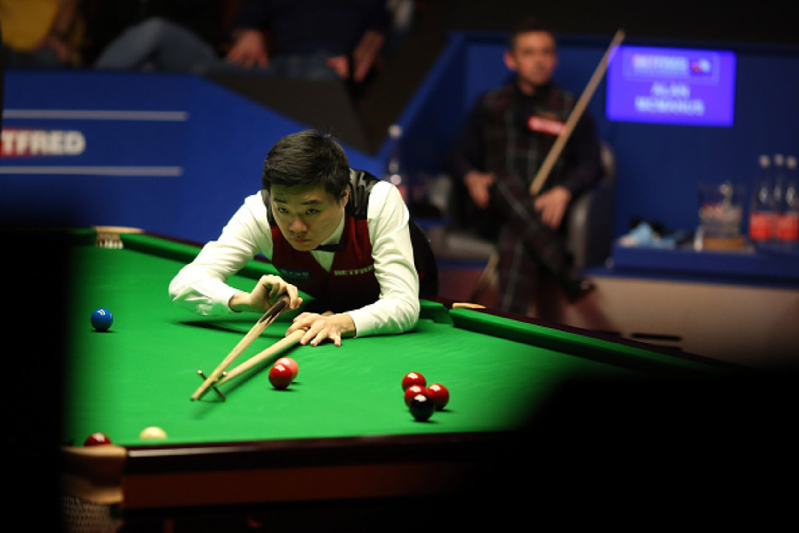 SHEFFIELD, ENGLAND - APRIL 29:  Ding Junhui of China in action during his semi final match against Alan McManus of Scotland on day fourteen of the World Championship Snooker at Crucible Theatre on April 29, 2016 in Sheffield, England.  (Photo by Nigel Rod