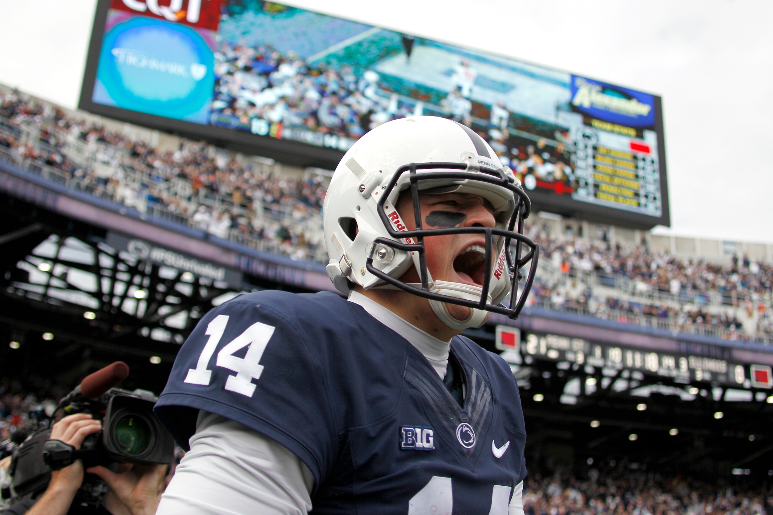 STATE COLLEGE, PA - OCTOBER 31:  Christian Hackenberg #14 of the Penn State Nittany Lions celebrates after catching a 14 yard touchdown pass in the third quarter against the Illinois Fighting Illini during the game on October 31, 2015 at Beaver Stadium in
