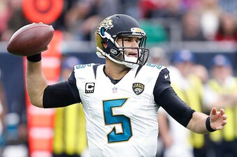 HOUSTON, TX - JANUARY 03: Blake Bortles #5 of the Jacksonville Jaguars throws a pass in the pocket agains the Houston Texans in the first quarter on January 3, 2016 at NRG Stadium in Houston, Texas. (Photo by Bob Levey/Getty Images)