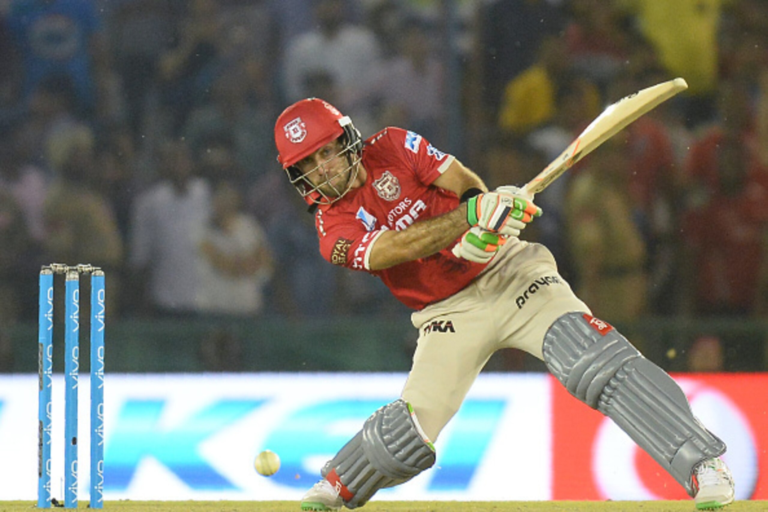 Kings XI Punjab  Glenn Maxwell (R)  plays a shot during the 2016 Indian Premier League (IPL) Twenty20 cricket match between Rising Pune Supergiants and Kings XI Punjab at The Punjab Cricket Association Stadium in Mohali on April 17, 2016  ------IMAGE REST