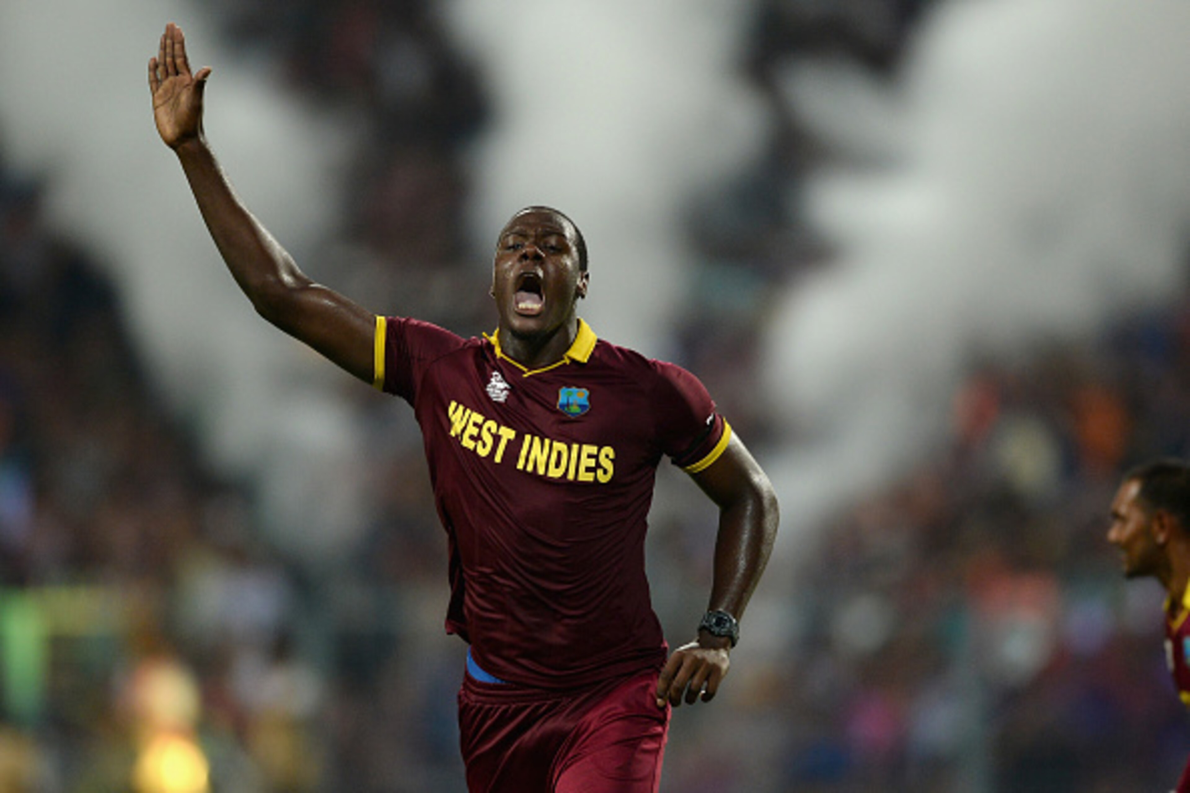 KOLKATA, WEST BENGAL - APRIL 03:  Carlos Brathwaite of the West Indies celebrates dismissing Joe Root of England during the ICC World Twenty20 India 2016 Final between England and the West Indies at Eden Gardens on April 3, 2016 in Kolkata, India.  (Photo