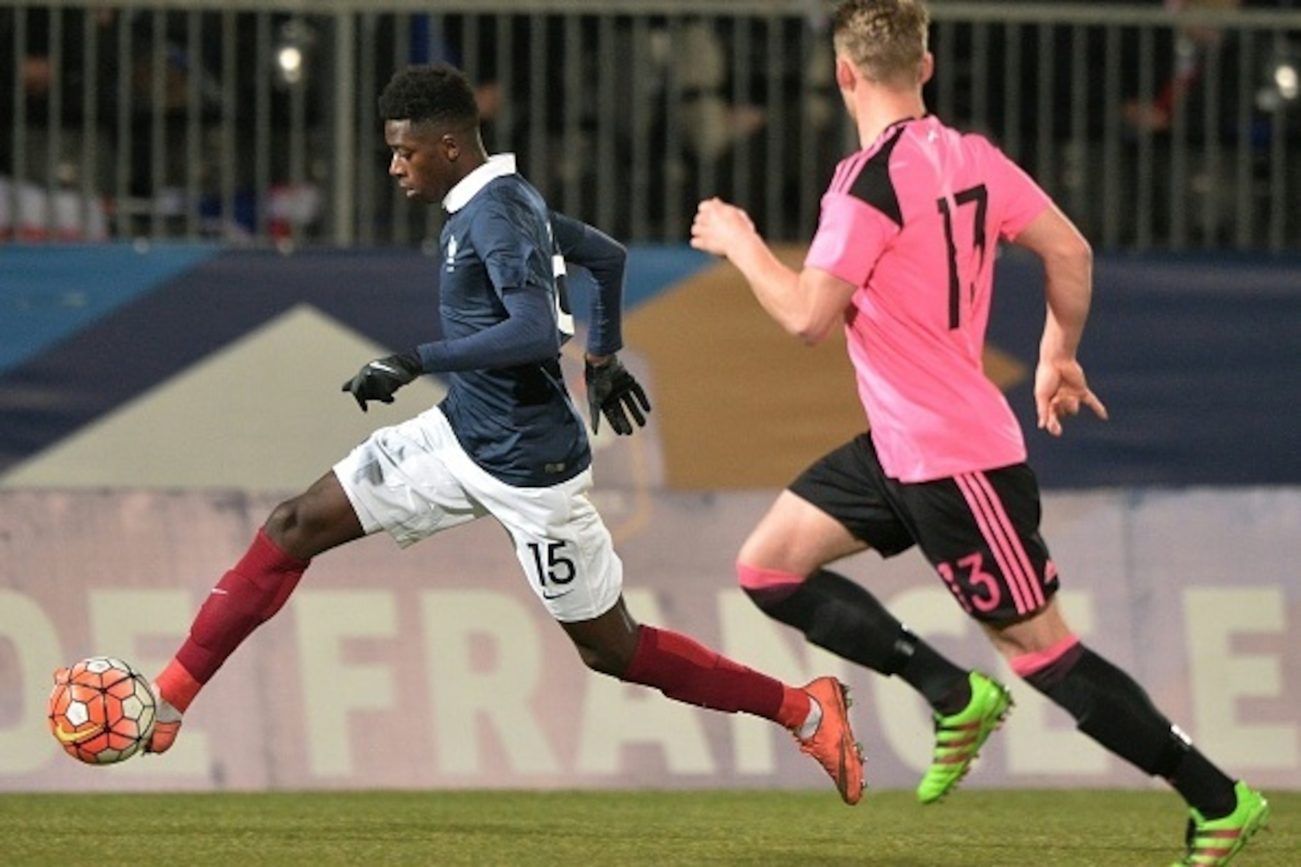 France's forward Ousmane Dembele (L) vies with Scotland's defender Stephen Kingsley (R) during the UEFA Euro 2017 U21 Championship qualifying football match between France and Scotland, on March 24, 2016, in Jean Bouin Stadium, in Angers, northwestern Fra