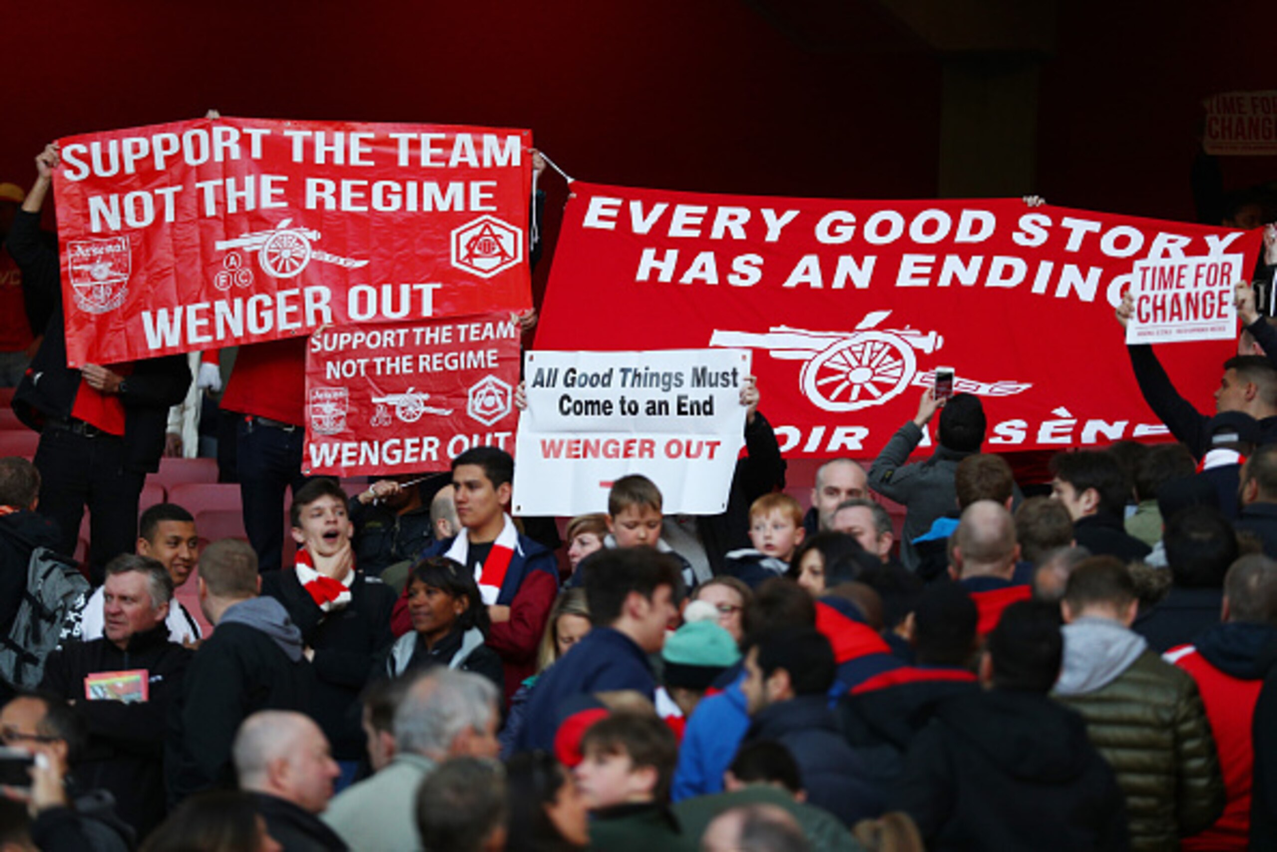 LONDON, ENGLAND - APRIL 30:  Arsenal supporters hold protest banners during the Barclays Premier League match between Arsenal and Norwich City at The Emirates Stadium on April 30, 2016 in London, England  (Photo by Paul Gilham/Getty Images)