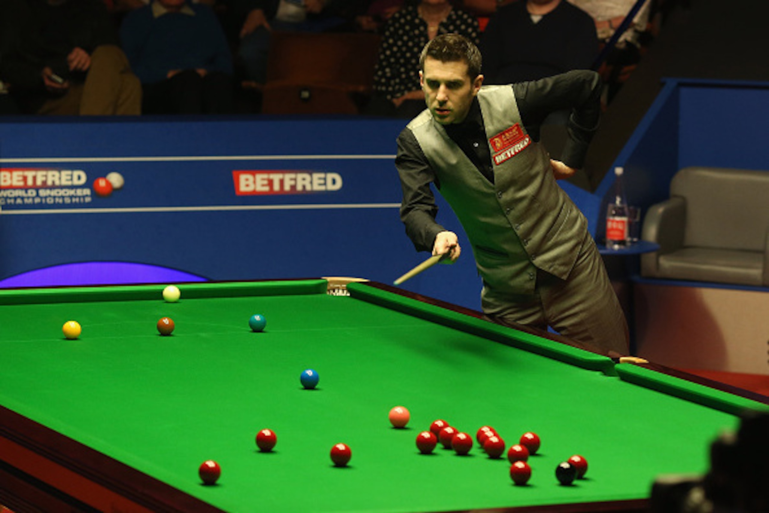 SHEFFIELD, ENGLAND - APRIL 30:  Mark Selby of England in action during his semi final match against  Marco Fu of Hong Kong on day fifteen of the World Championship Snooker at Crucible Theatre on April 30, 2016 in Sheffield, England.  (Photo by Nigel Roddi