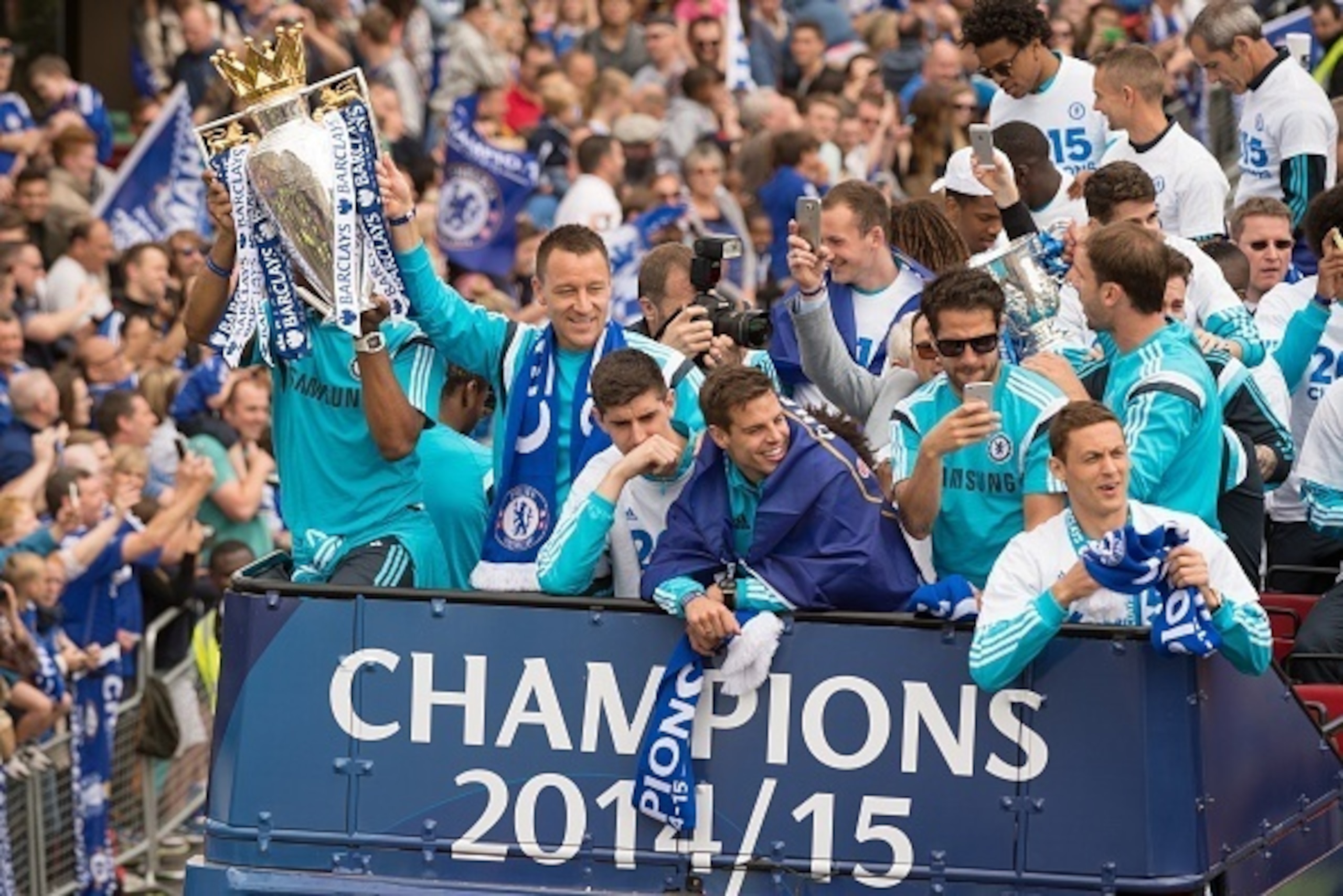 (Front L-R) Chelsea's Ivorian striker Didier Drogba, Chelsea's English defender John Terry, Chelsea's Belgian goalkeeper Thibaut Courtois, Chelsea's Spanish defender Cesar Azpilicueta, Chelsea's Spanish midfielder Cesc Fabregas and Chelsea's Serbian midfi