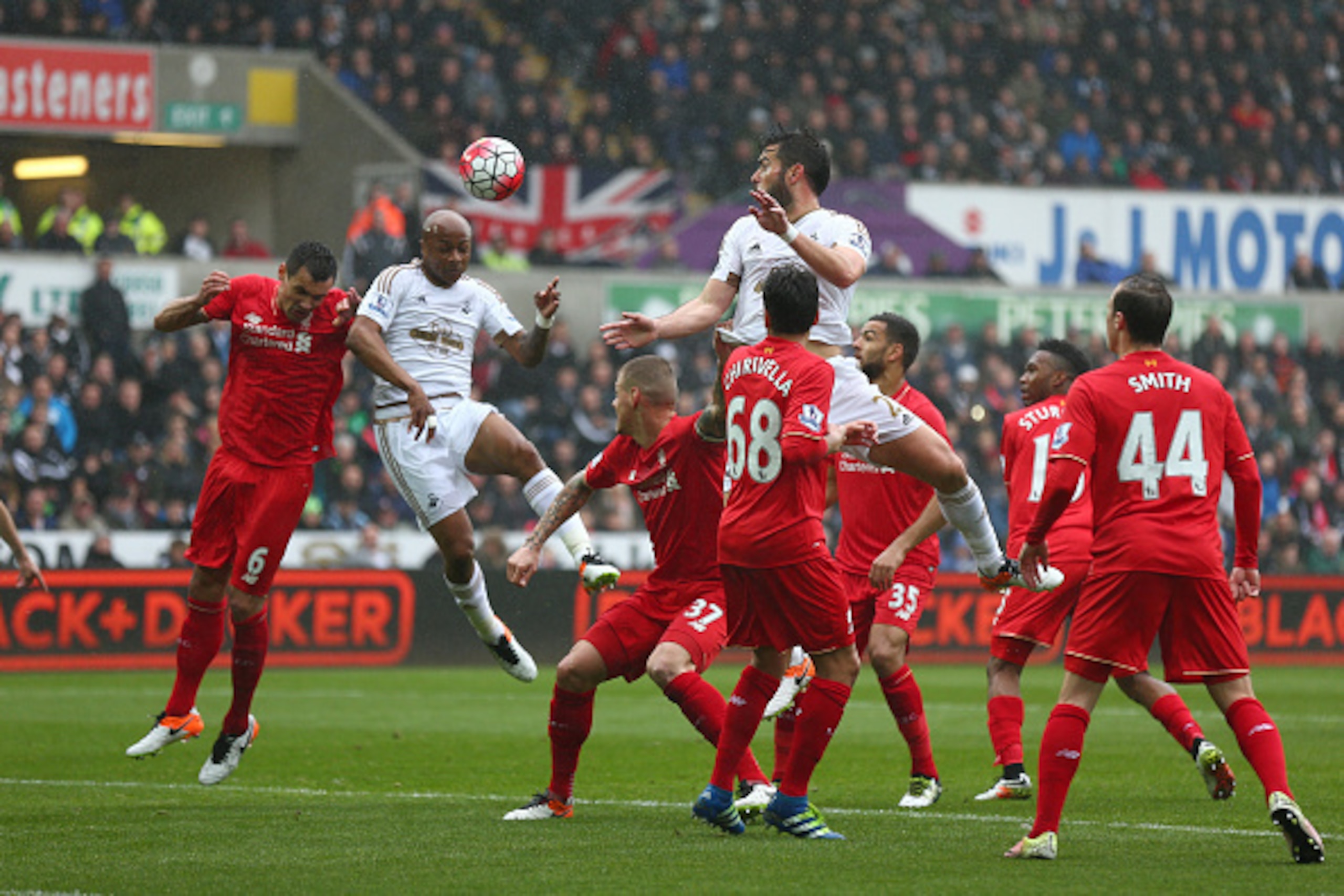 SWANSEA, WALES - MAY 01:  Andre Ayew of Swansea City scores the opening goal with a header during the Barclays Premier League match between Swansea City and Liverpool at The Liberty Stadium on May 1, 2016 in Swansea, Wales.  (Photo by Steve Bardens/Getty 