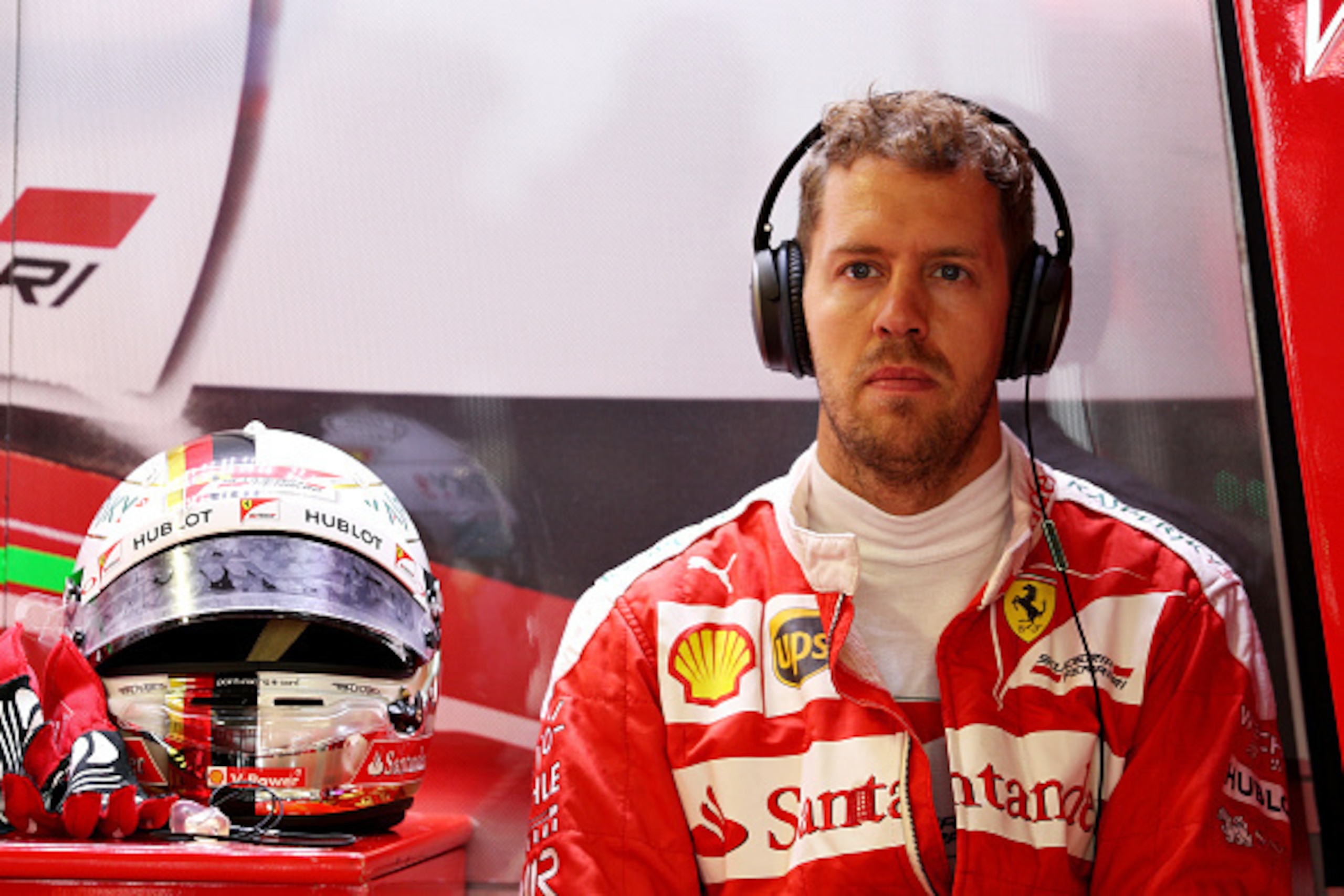 SOCHI, RUSSIA - APRIL 30: Sebastian Vettel of Germany and Ferrari in the garage during qualifying for the Formula One Grand Prix of Russia at Sochi Autodrom on April 30, 2016 in Sochi, Russia.  (Photo by Mark Thompson/Getty Images)