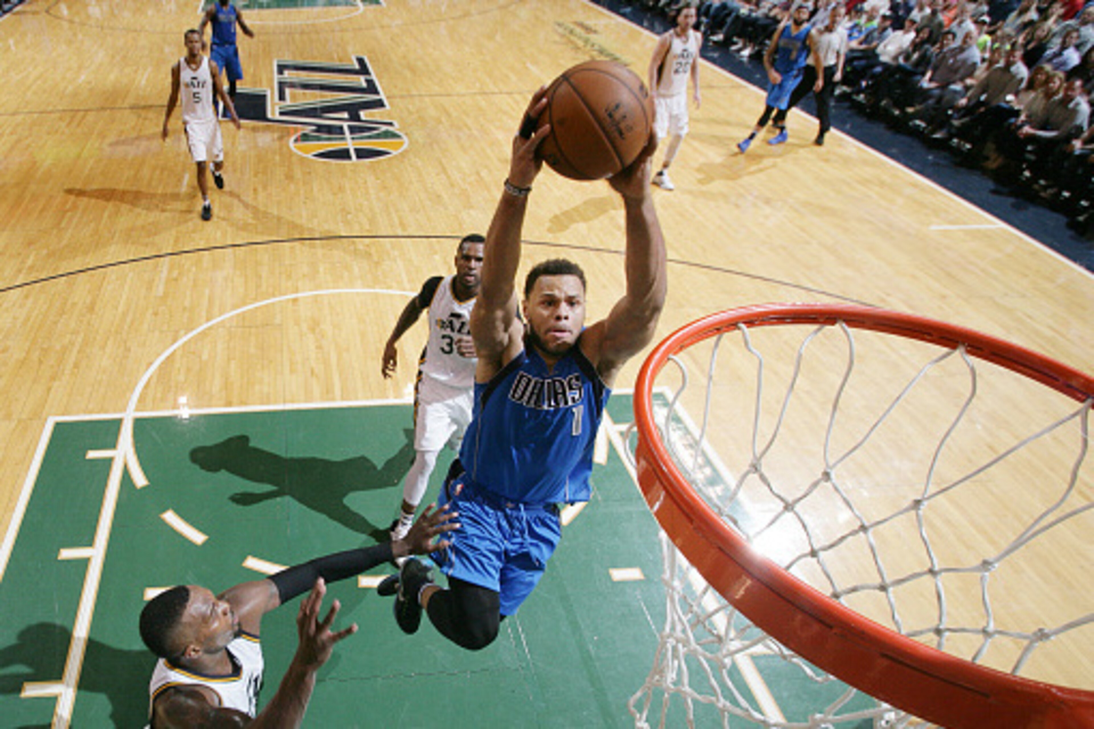 SALT LAKE CITY, UT - APRIL 11:  Justin Anderson #1 of the Dallas Mavericks dunks against the Utah Jazz on April 11, 2016 at vivint.SmartHome Arena in Salt Lake City, Utah. NOTE TO USER: User expressly acknowledges and agrees that, by downloading and or us