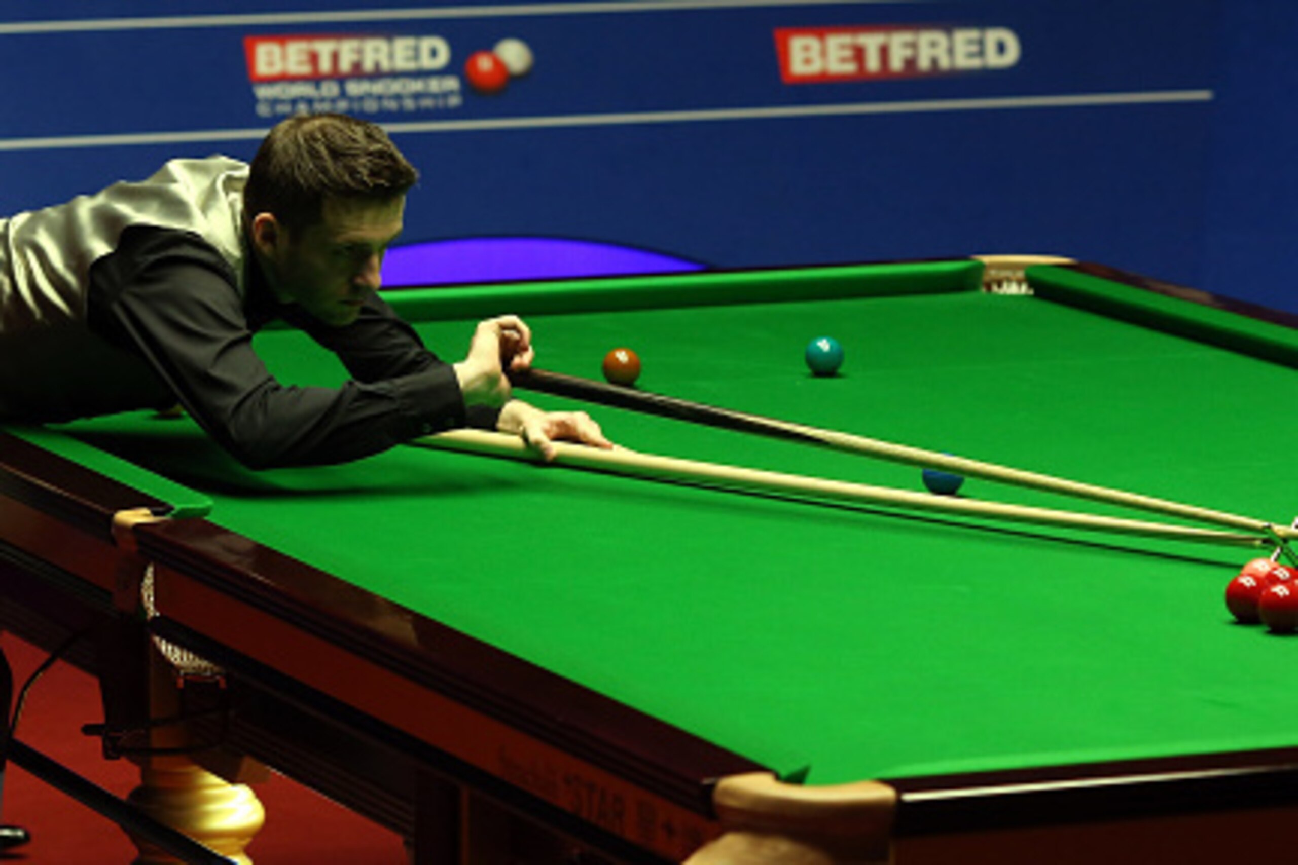 SHEFFIELD, ENGLAND - MAY 01:  Mark Selby of England in action during the final against Ding Junhui of China on day sixteen of the World Championship Snooker at Crucible Theatre on May 01, 2016 in Sheffield, England.  (Photo by Nigel Roddis/Getty Images)