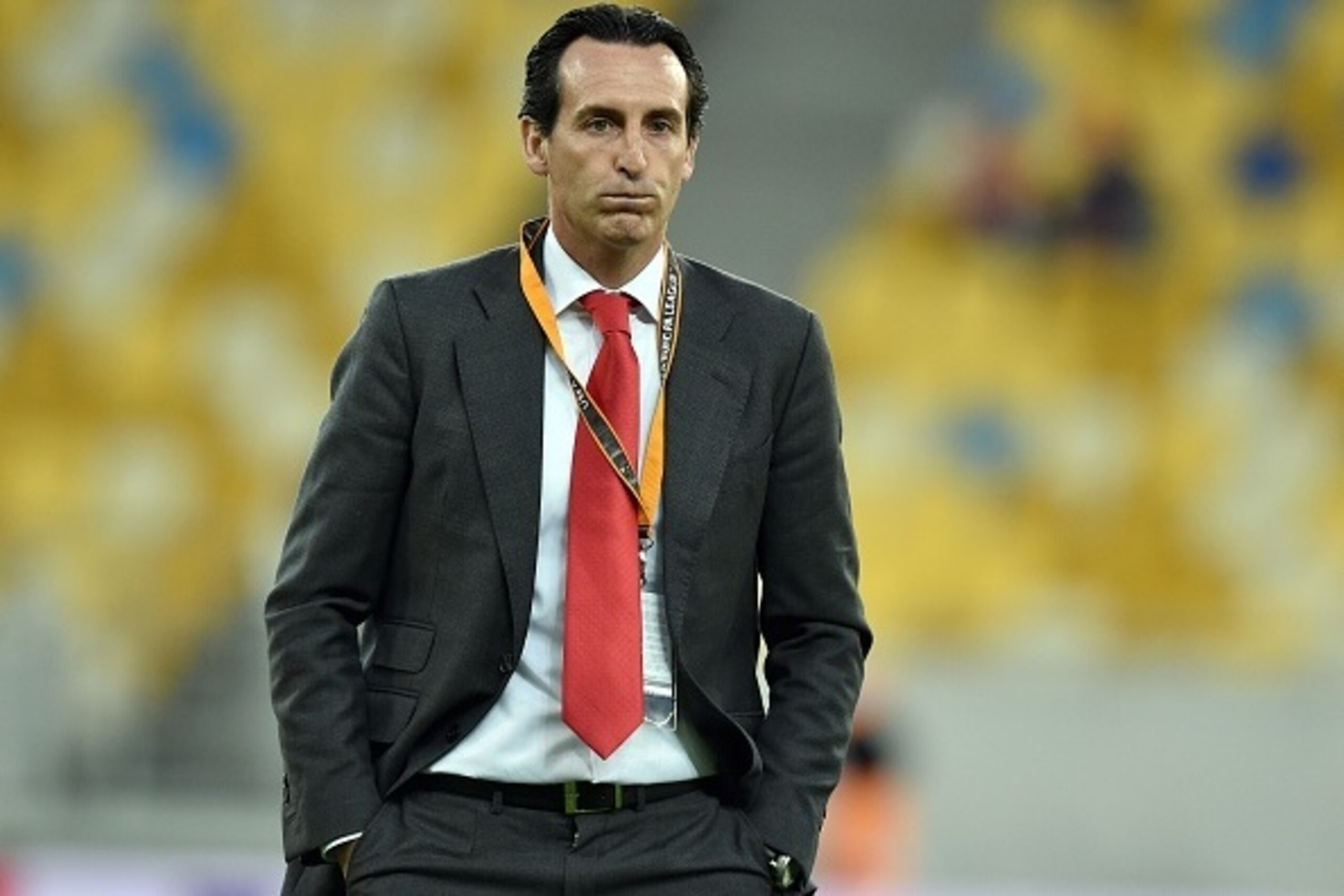 Sevillas head coach Unai Emery walks on the pitch before the UEFA Europa League semi-final football match FC Shakhtar Donetsk vs Sevilla FC at the Arena Lviv stadium in Lviv on April 28, 2016. / AFP / GENYA SAVILOV        (Photo credit should read GENYA S