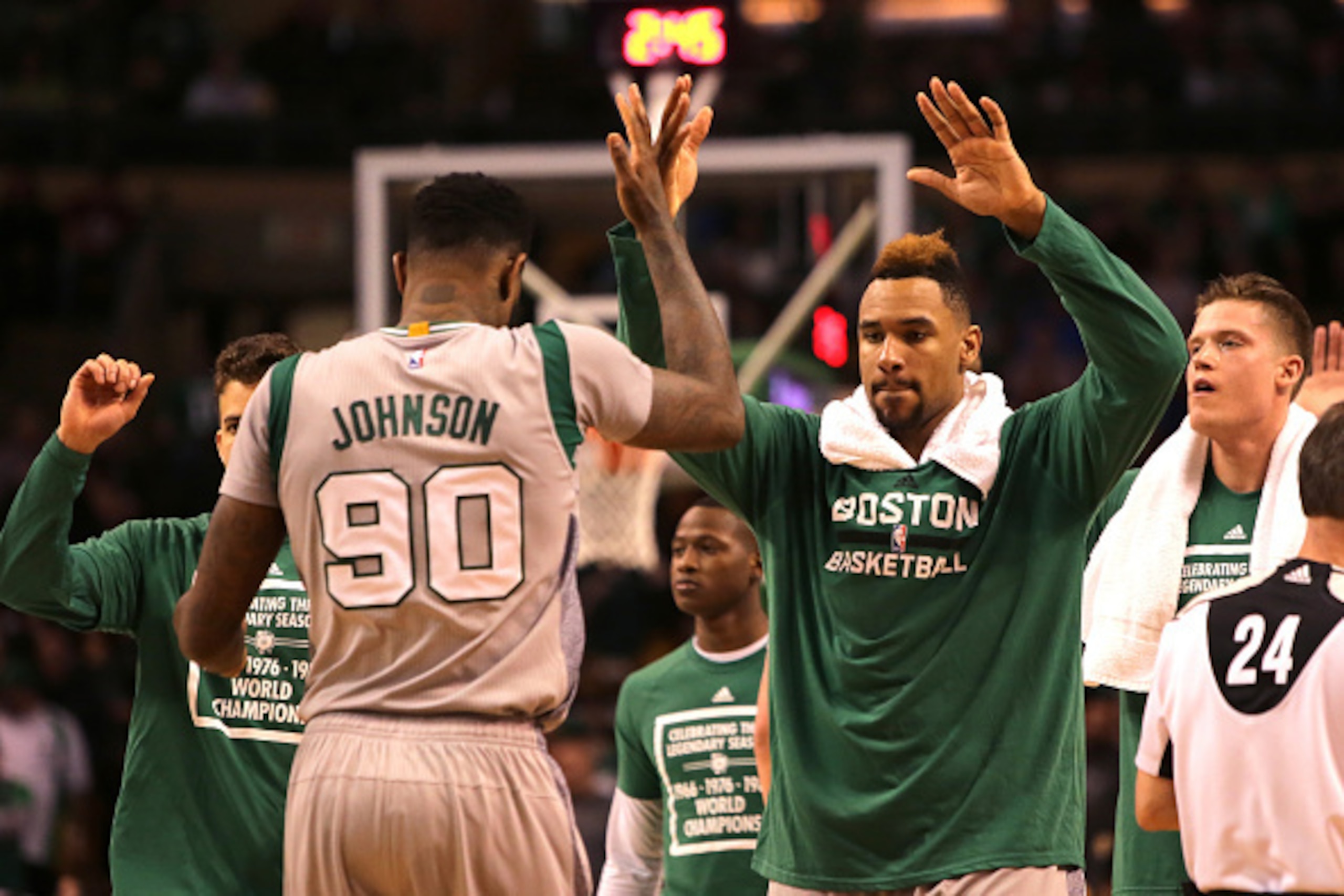 BOSTON, MA - APRIL 13: Amir Johnson #90 and Jared Sullinger #7 of the Boston Celtics celebrate in the fourth quater against the Miami Heat at TD Garden on April 13, 2016 in Boston, Massachusetts. NOTE TO USER: User expressly acknowledges and agrees that, 