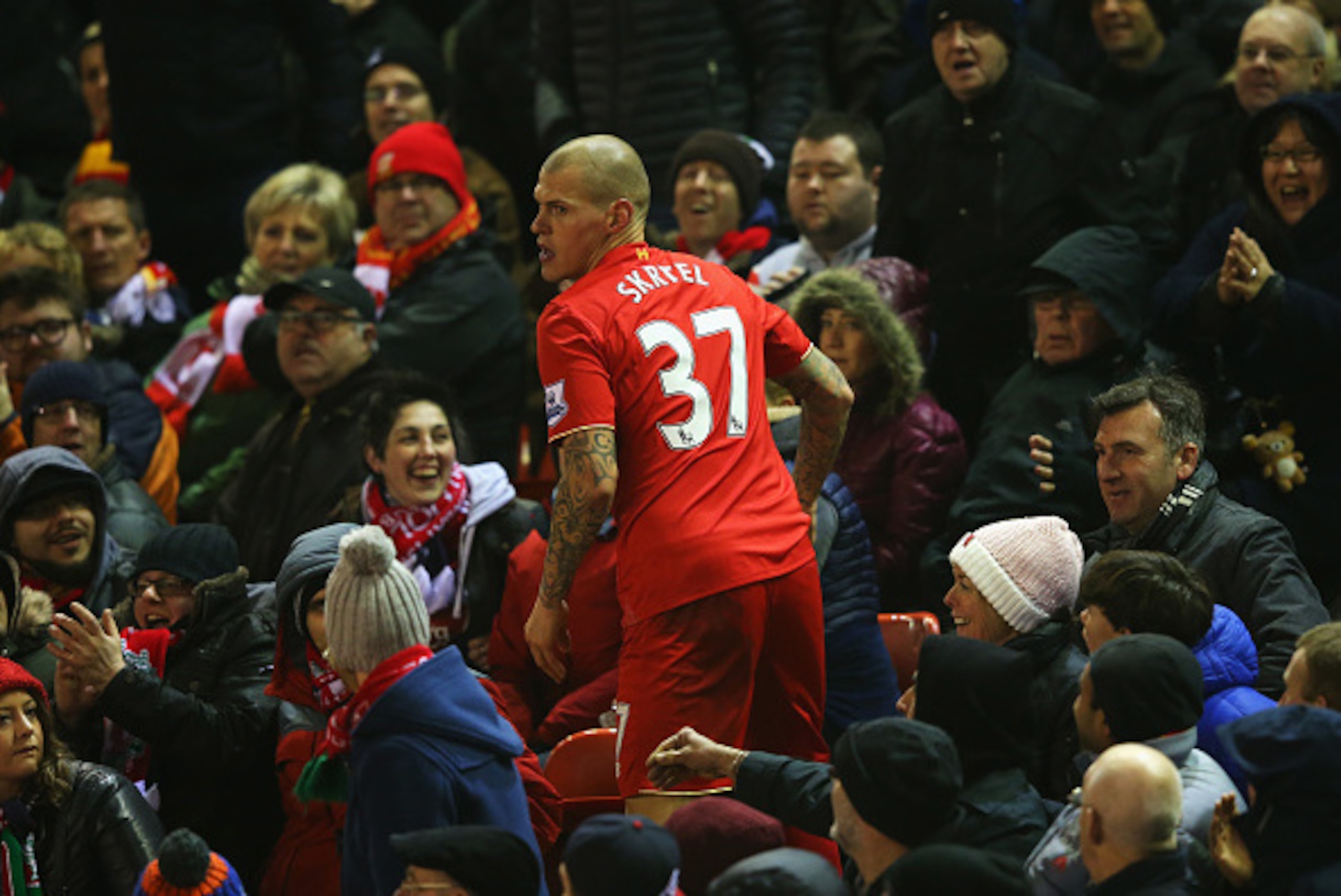 LIVERPOOL, ENGLAND - DECEMBER 13:  Martin Skrtel of Liverpool looks on after being pushed into the crowdduring the Barclays Premier League match between Liverpool and West Bromwich Albion at Anfield on December 13, 2015 in Liverpool, England.  (Photo by A