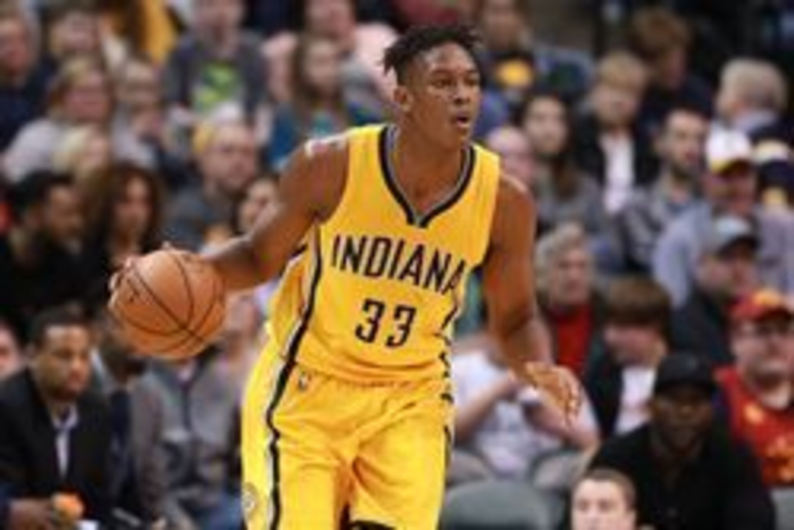 Mar 24, 2016; Indianapolis, IN, USA; Indiana Pacers center Myles Turner (33) dribbles the ball against the New Orleans Pelicans at Bankers Life Fieldhouse. The Pacers won 92-84. Mandatory Credit: Brian Spurlock-USA TODAY Sports