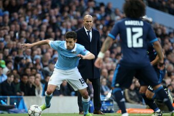 MANCHESTER, ENGLAND - APRIL 26: Coach of Real Madrid Zinedine Zidane reacts during the UEFA Champions League semi final first leg match between Manchester City FC and Real Madrid at Etihad Stadium on April 26, 2016 in Manchester, United Kingdom. (Photo by