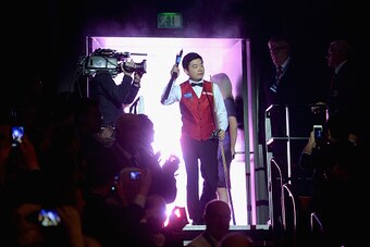 SHEFFIELD, ENGLAND - MAY 02:  Ding Junhui walks into the arena ahead of the final session of the World Snooker Championship final at the Crucible Theatre on May 02, 2016 in Sheffield, England.  (Photo by Gareth Copley/Getty Images)