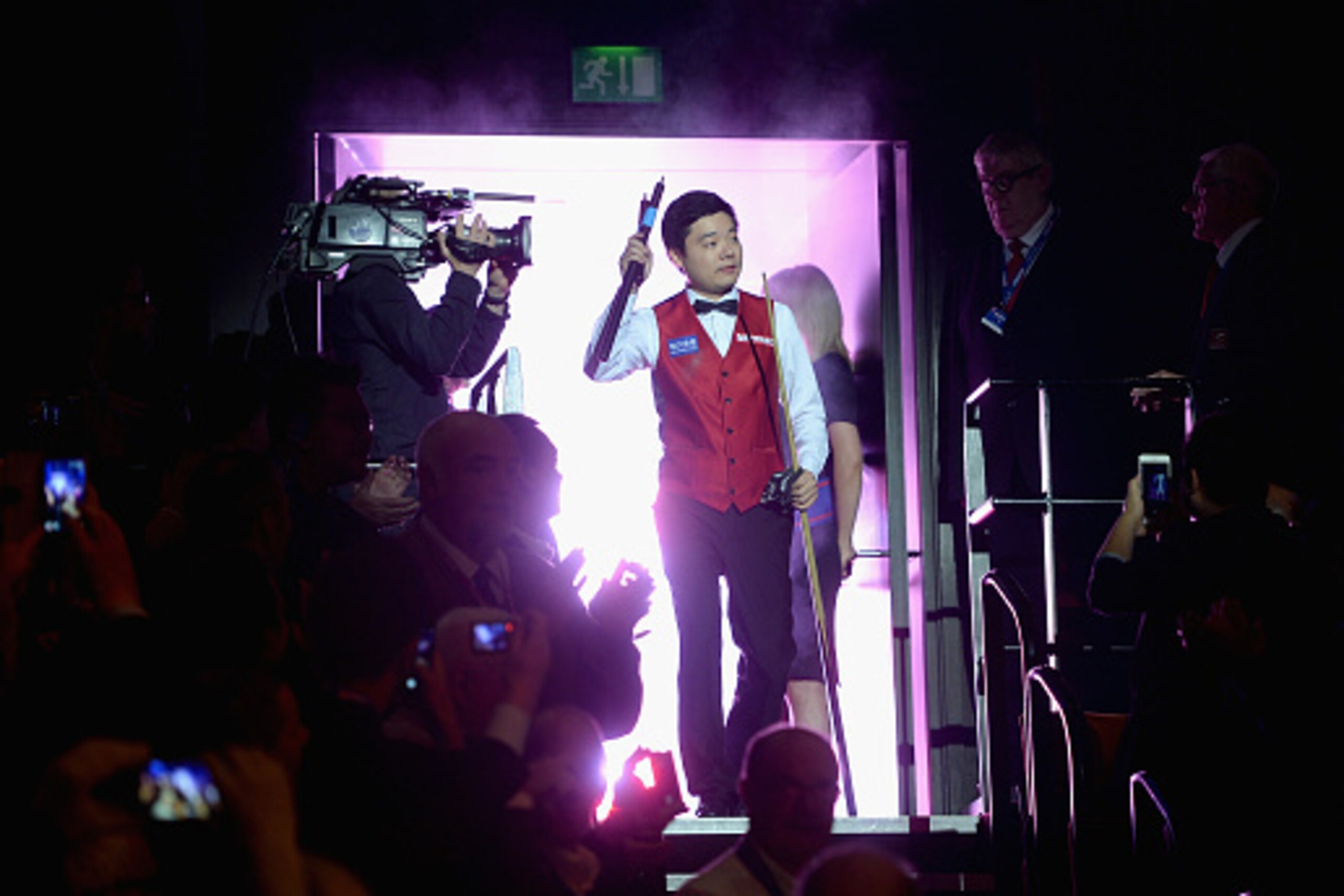 SHEFFIELD, ENGLAND - MAY 02:  Ding Junhui walks into the arena ahead of the final session of the World Snooker Championship final at the Crucible Theatre on May 02, 2016 in Sheffield, England.  (Photo by Gareth Copley/Getty Images)