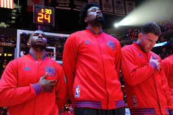 LOS ANGELES, CA - APRIL 20: Chris Paul #3, DeAndre Jordan #6, and Blake Griffin #32 of the Los Angeles Clippers stand for a moment of silence for the National Anthem before the game against the Portland Trail Blazers in Game Two of the Western Conference 