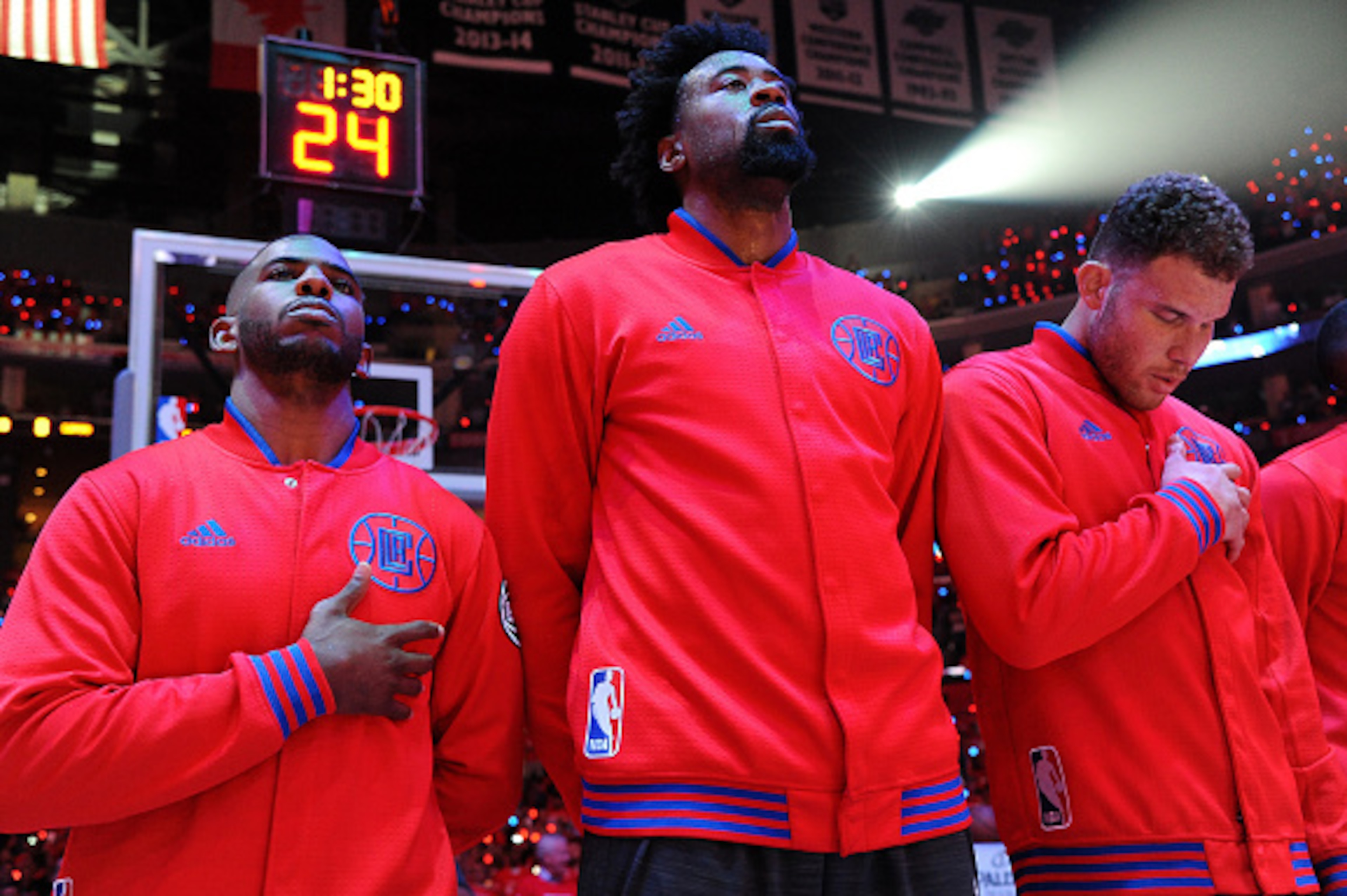 LOS ANGELES, CA - APRIL 20: Chris Paul #3, DeAndre Jordan #6, and Blake Griffin #32 of the Los Angeles Clippers stand for a moment of silence for the National Anthem before the game against the Portland Trail Blazers in Game Two of the Western Conference 