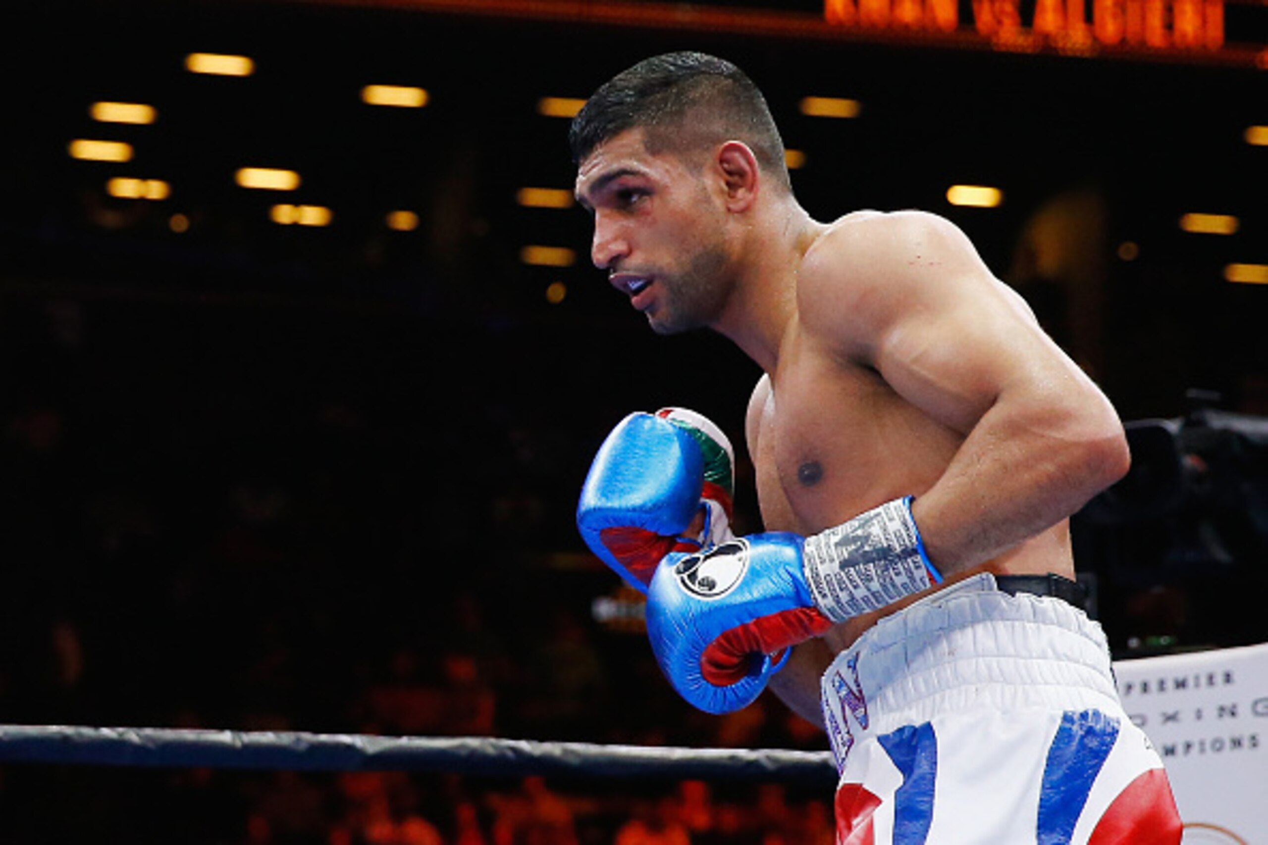 NEW YORK, NY - MAY 29:  Amir Khan in action against Chris Algieri during their Welterweight bout at Barclays Center of Brooklyn on May 29, 2015 in New York City.  (Photo by Al Bello/Getty Images)