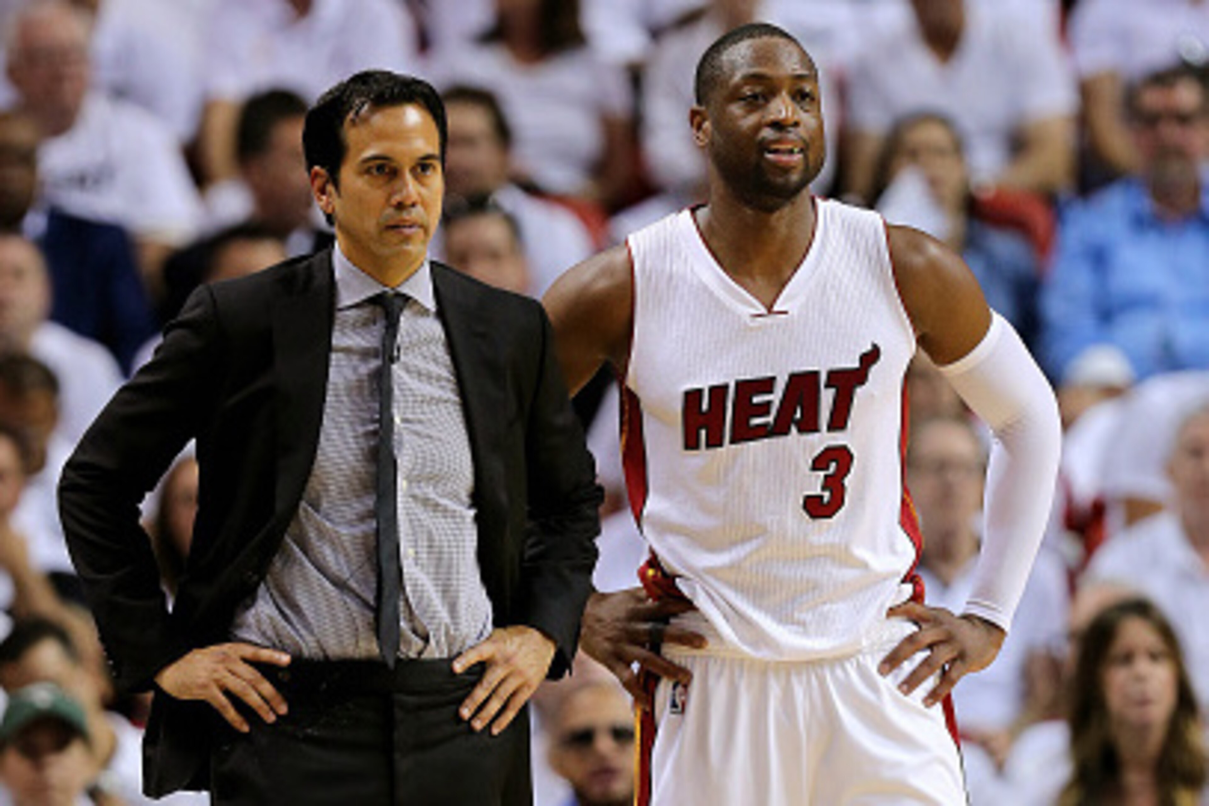 MIAMI, FL - MAY 01: Head coach Erik Spoelstra and Dwyane Wade #3 of the Miami Heat look on during Game Seven of the Eastern Conference Quarterfinals of the 2016 NBA Playoffs against the Charlotte Hornets at American Airlines Arena on May 1, 2016 in Miami MIAMI, FL - MAY 01: Head coach Erik Spoelstra and Dwyane Wade #3 of the Miami Heat look on during Game Seven of the Eastern Conference Quarterfinals of the 2016 NBA Playoffs against the Charlotte Hornets at American Airlines Arena on May 1, 2016 in Miami
