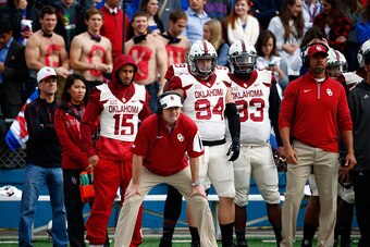 LAWRENCE, KS - OCTOBER 31:  Head coach Bob Stoops of the Oklahoma Sooners watches from the sidelines during the game against the Kansas Jayhawks at Memorial Stadium on October 31, 2015 in Lawrence, Kansas.  (Photo by Jamie Squire/Getty Images)