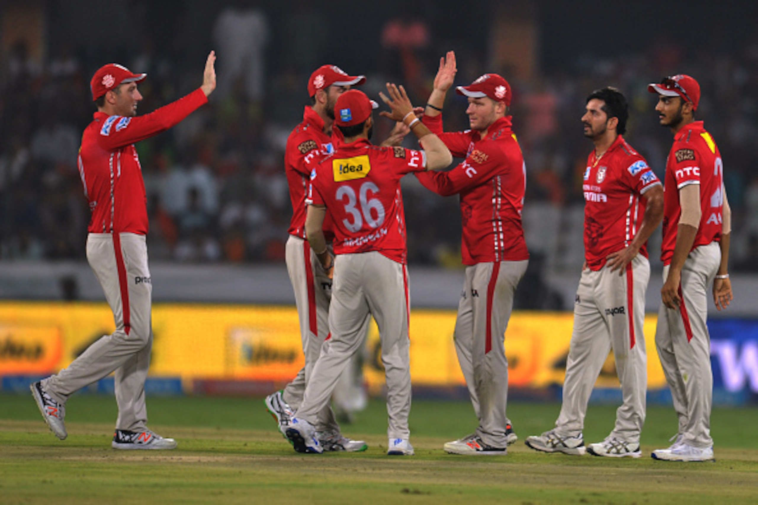 Kings XI Punjab's team celebrates the wicket of Eoin Morgan of  Sunrisers Hyderabad during the 2016 Indian Premier League (IPL) Twenty20 cricket match between Sunrisers Hyderabad and Kings XI Punjab at The Rajiv Gandhi International Stadium in Hyderabad o