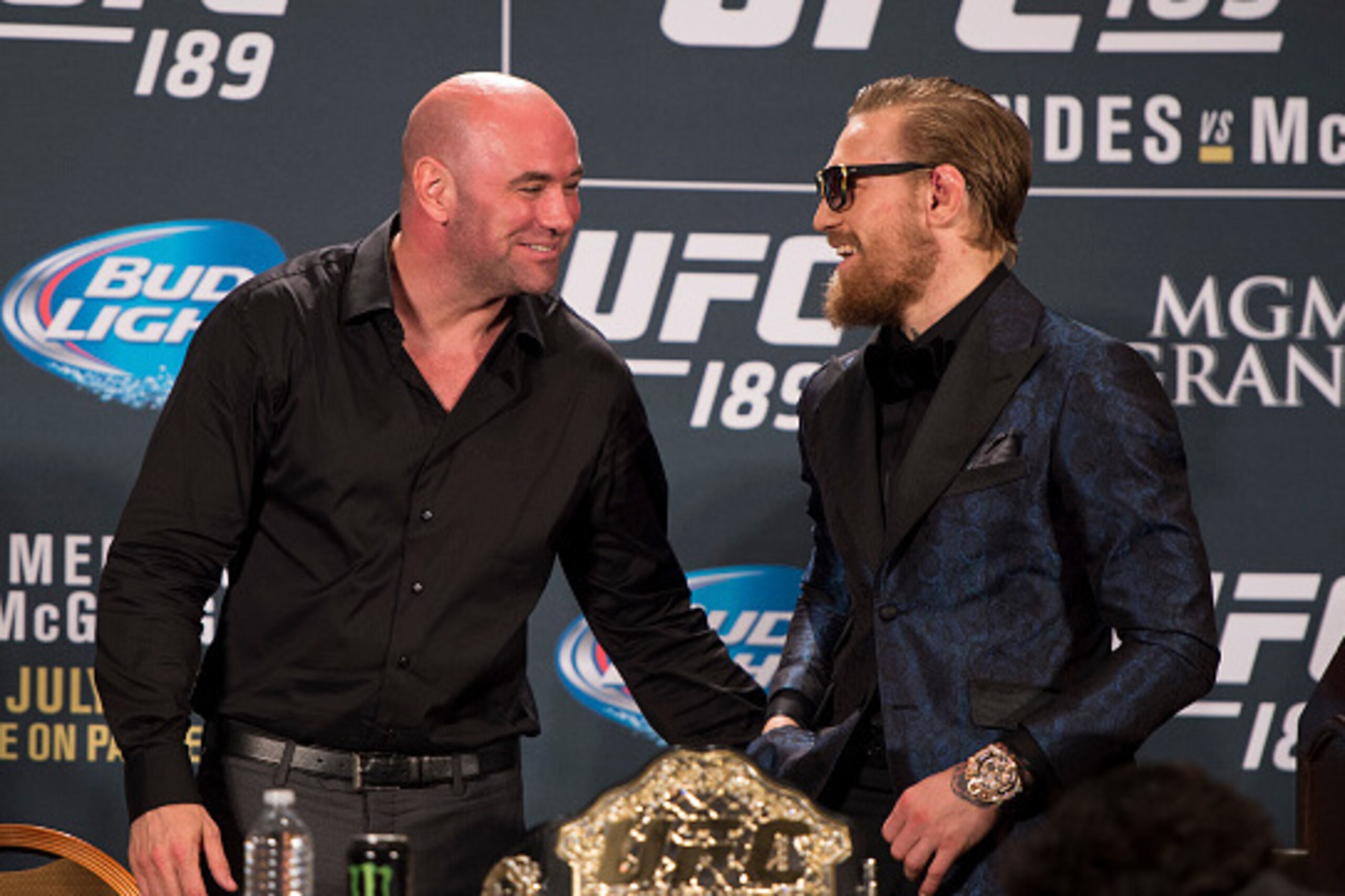 LAS VEGAS, NV - JULY 11:  UFC President Dana White (L) and UFC interim featherweight champion Conor McGregor interact during the UFC 189 post fight press conference at the MGM Grand Garden Arena on July 11, 2015 in Las Vegas, Nevada. (Photo by Jeff Bottar