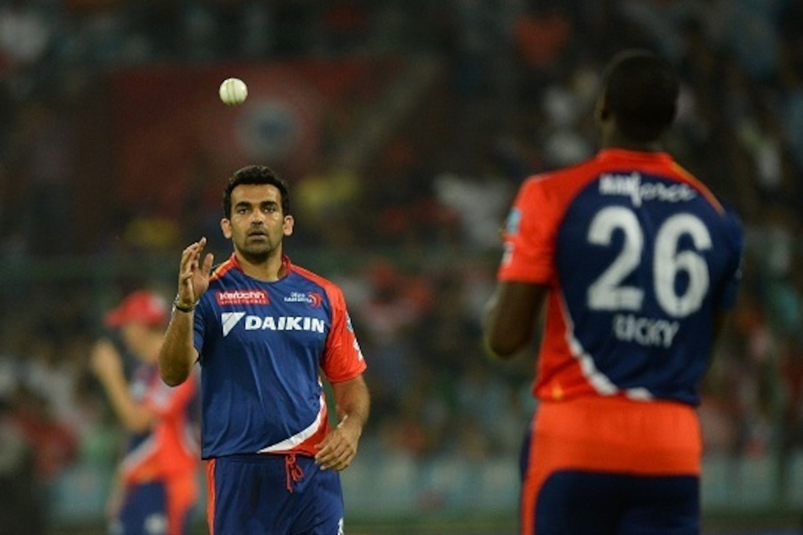 Delhi Daredevils team captain Zaheer Khan(L) catches the ball as he walks towards the bowling end during the 2016 Indian Premier League (IPL) Twenty20 cricket match between Delhi Daredevils and Kings XI Punjab at The Feroz Shah Kotla Cricket Stadium in Ne Delhi Daredevils team captain Zaheer Khan(L) catches the ball as he walks towards the bowling end during the 2016 Indian Premier League (IPL) Twenty20 cricket match between Delhi Daredevils and Kings XI Punjab at The Feroz Shah Kotla Cricket Stadium in Ne
