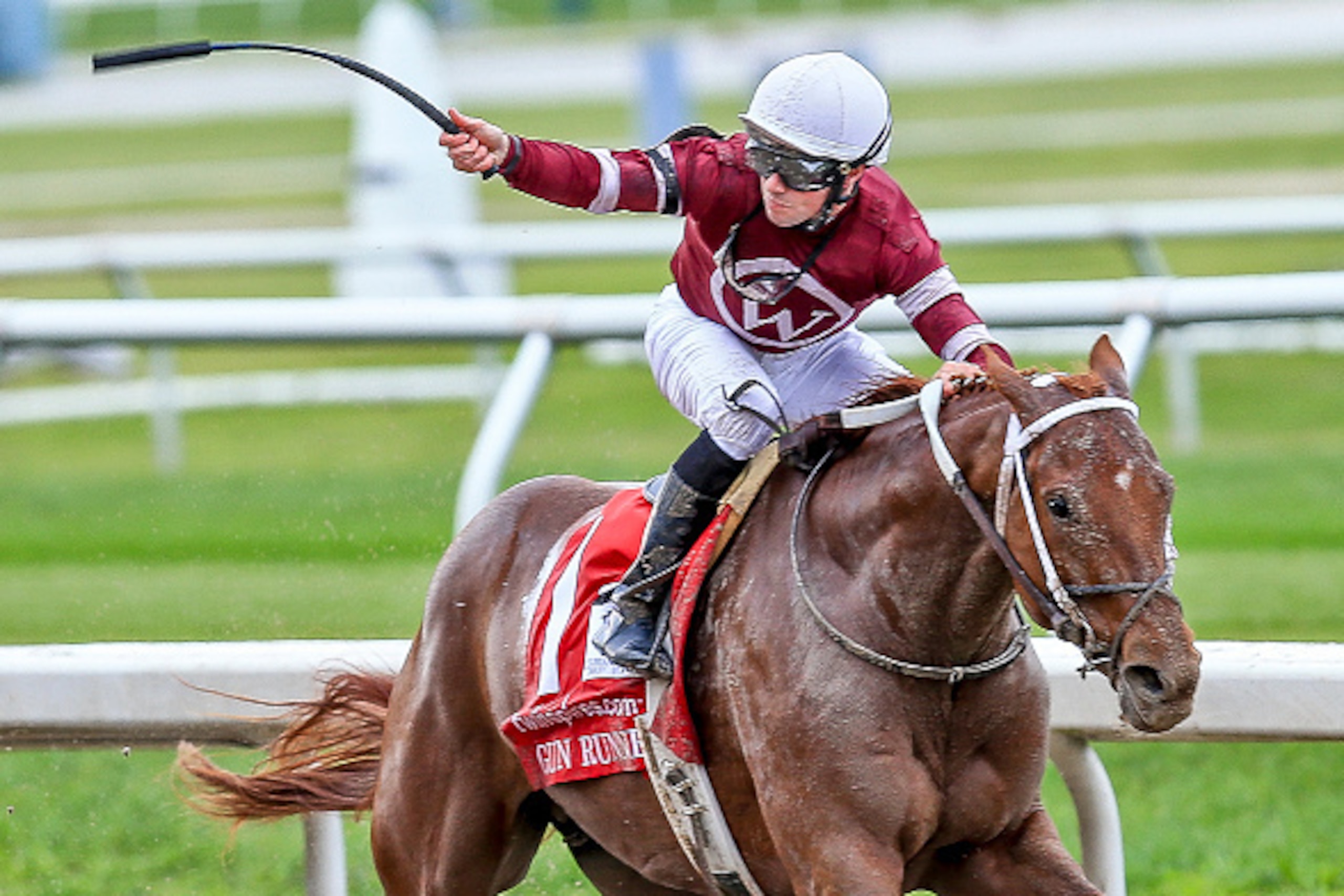 NEW ORLEANS, LA - MARCH 26:  Gun Runner #1 ridden by Florent Geroux wins the 103rd Louisiana Derby at Fairgrounds Race Course on March 26, 2016 in New Orleans, Louisiana. (Photo by Steve Dalmado/Eclipse Sportswire/Getty Images)