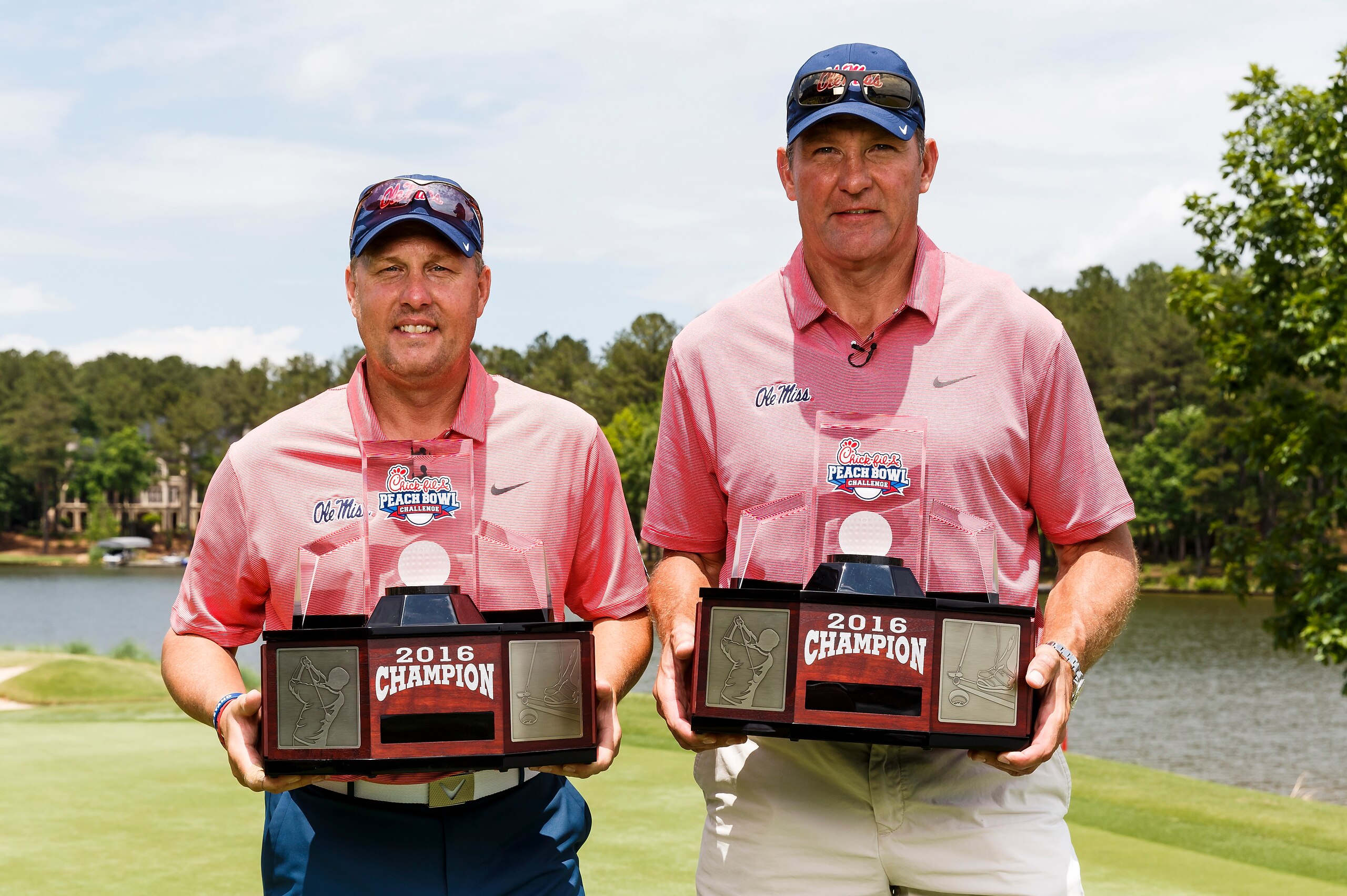 Ole Miss head coach Hugh Freeze (left) and Wesley Walls.