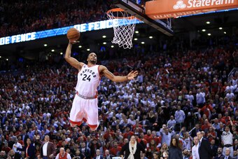 TORONTO, ON - APRIL 26:  Norman Powell #24 of the Toronto Raptors dunks the ball late in the second half of Game Five of the Eastern Conference Quarterfinals against the Indiana Pacers during the 2016 NBA Playoffs at the Air Canada Centre on April 26, 201