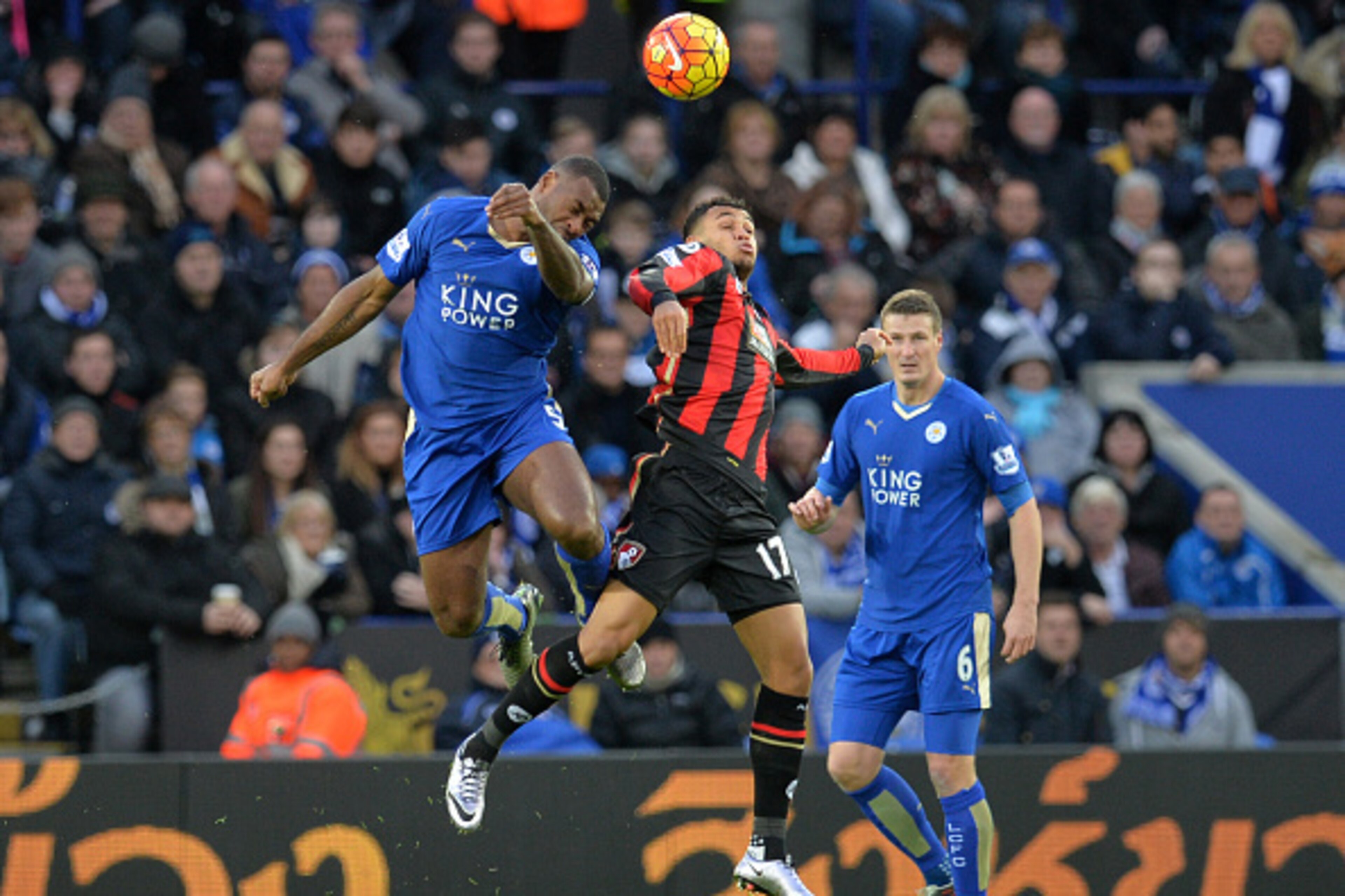 Bournemouth's Norwegian striker Joshua King (2nd L) vies with Leicester City's English defender Wes Morgan and Leicester City's German defender Robert Huth (6) during the English Premier League football match between Leicester City and Bournemouth at King Bournemouth's Norwegian striker Joshua King (2nd L) vies with Leicester City's English defender Wes Morgan and Leicester City's German defender Robert Huth (6) during the English Premier League football match between Leicester City and Bournemouth at King