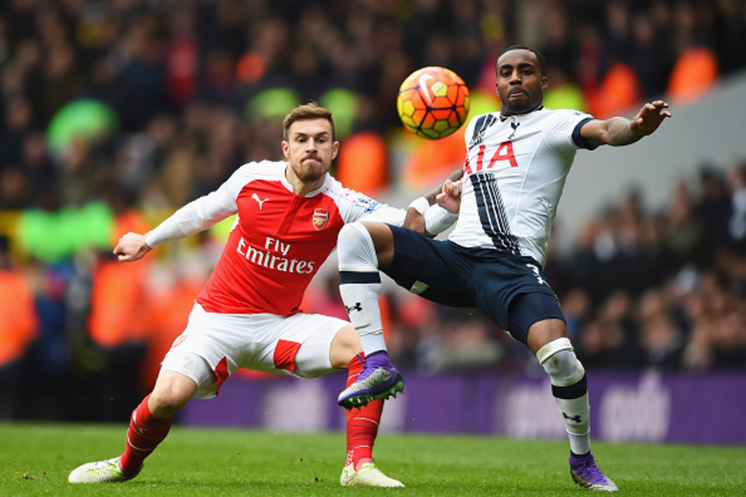 LONDON, ENGLAND - MARCH 05:  Aaron Ramsey of Arsenal and Danny Rose of Tottenham Hotspur battle for the ball during the Barclays Premier League match between Tottenham Hotspur and Arsenal at White Hart Lane on March 5, 2016 in London, England.  (Photo by 
