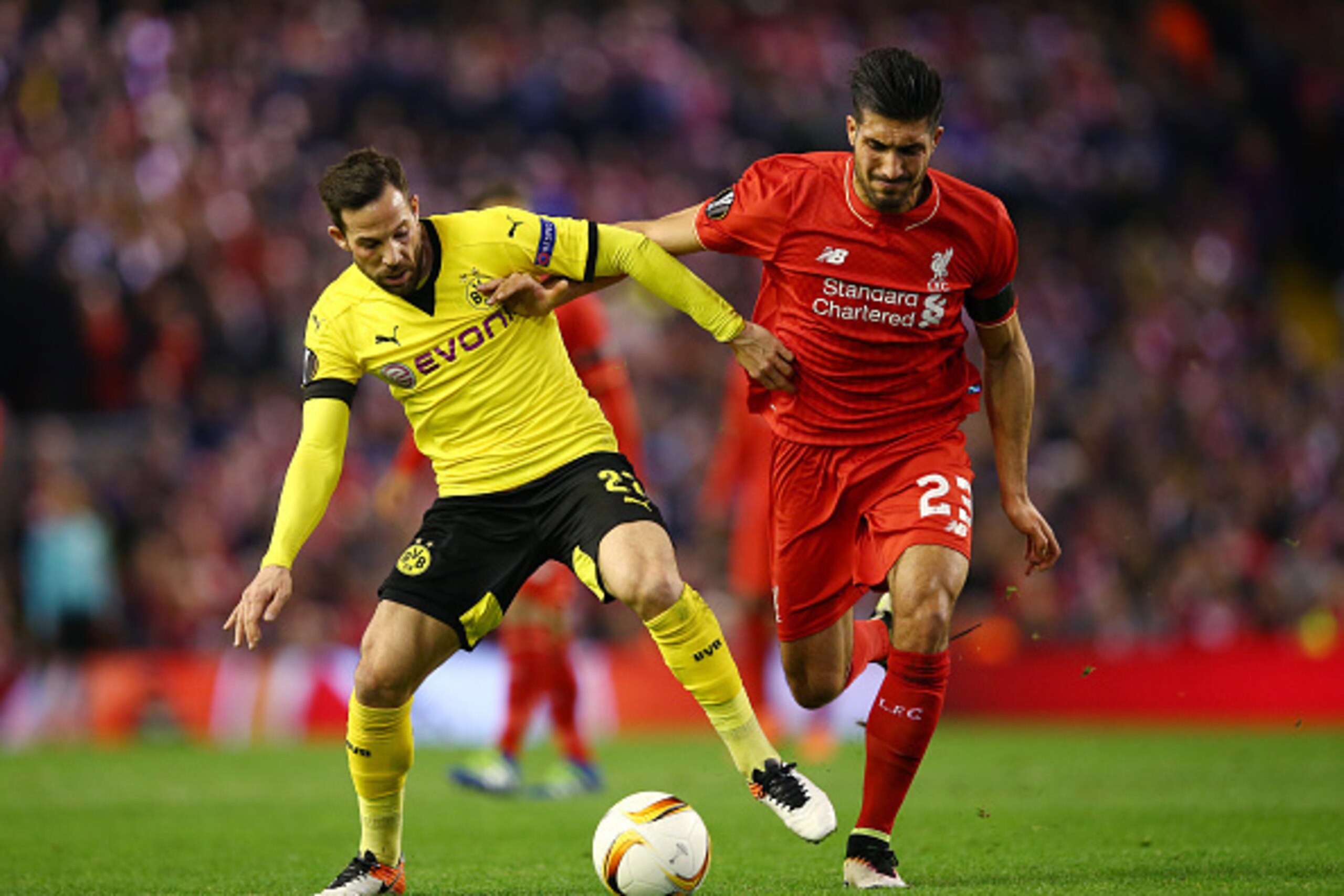 LIVERPOOL, ENGLAND - APRIL 14:  Gonzalo Castro of Borussia Dortmund goes past Emre Can of Liverpool during the UEFA Europa League quarter final, second leg match between Liverpool and Borussia Dortmund at Anfield on April 14, 2016 in Liverpool, United Kin